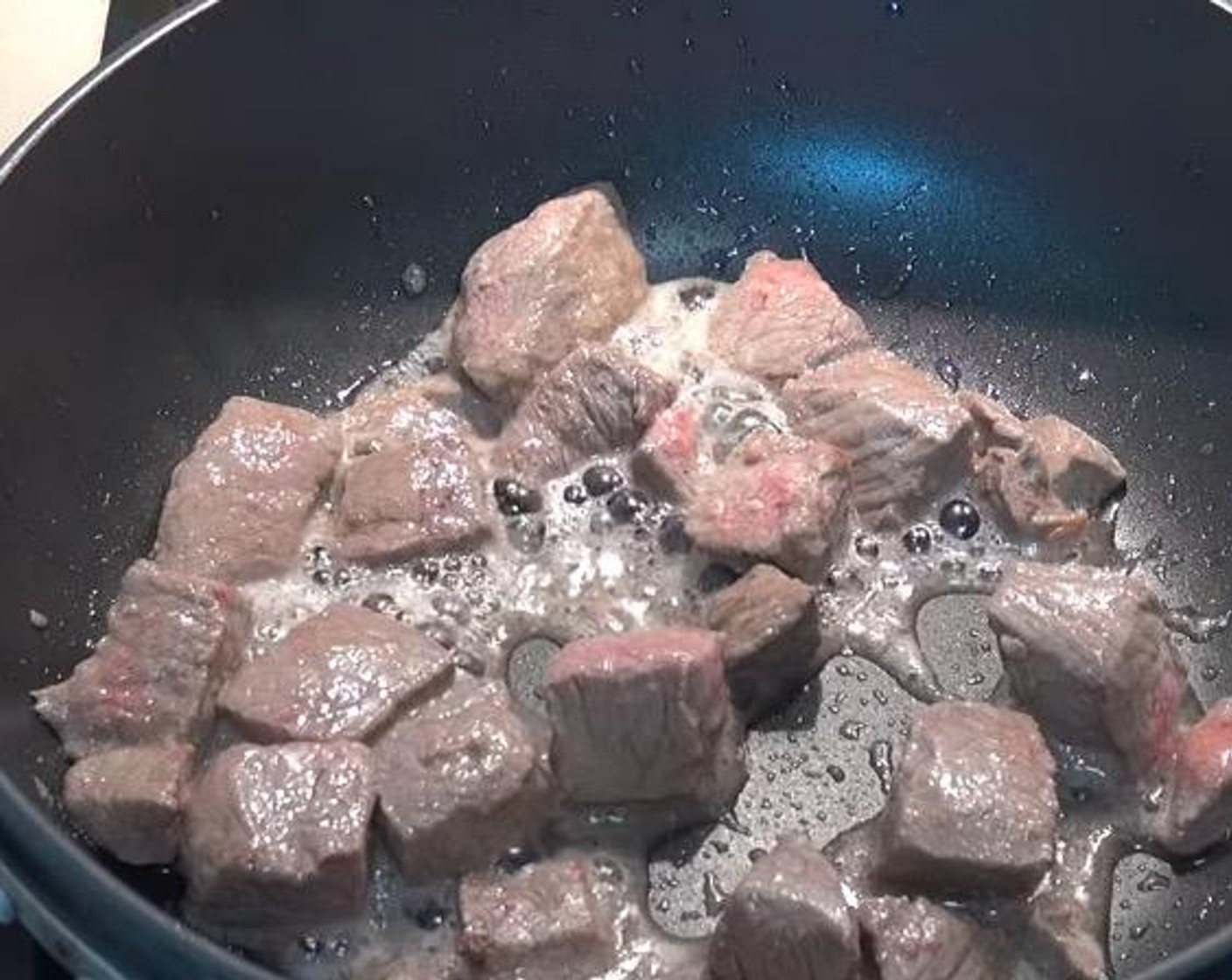 step 1 In a frying pan, add Olive Oil (as needed) and Beef (2.2 lb) and cook until brown. Transfer onto a plate and set aside.