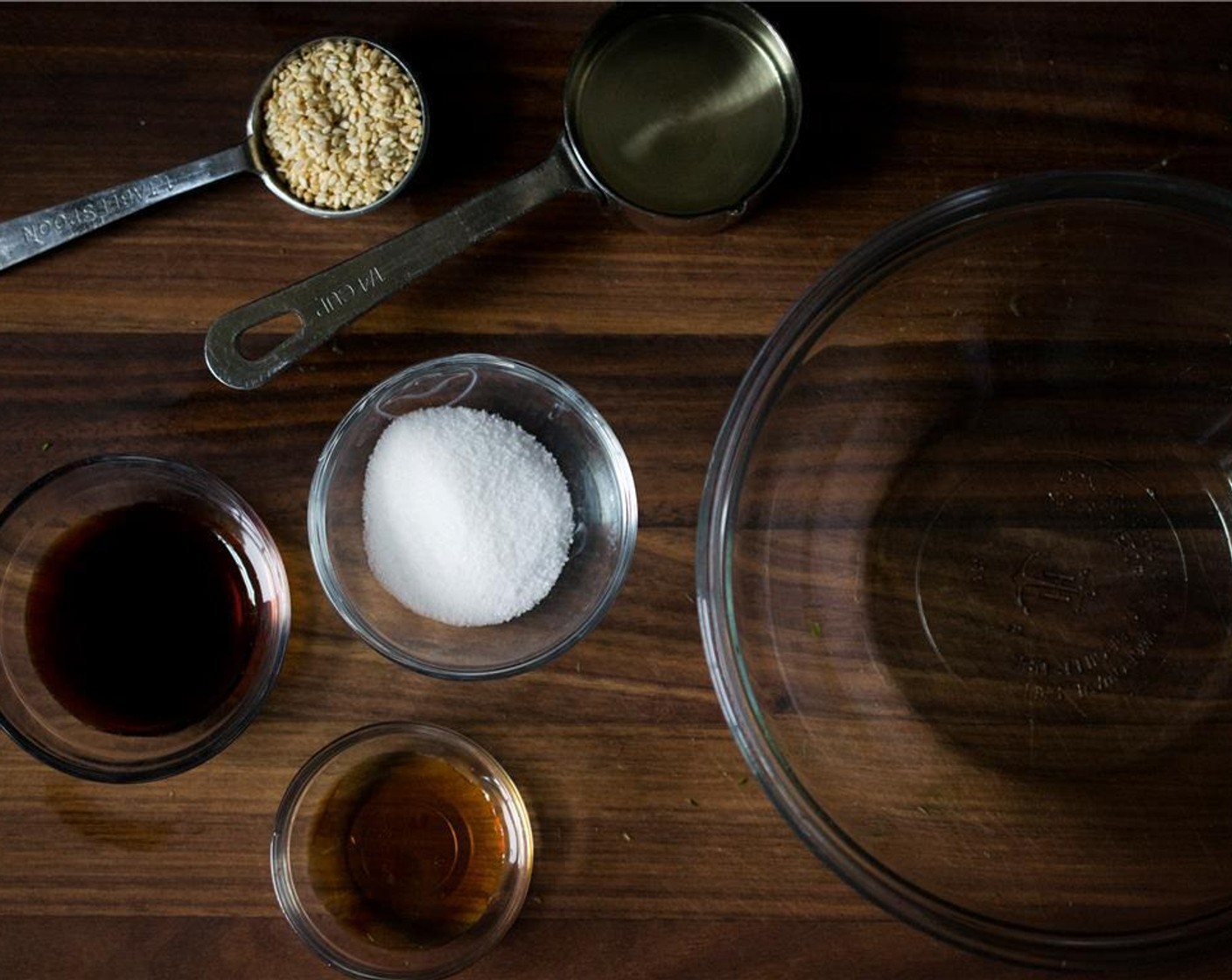 step 5 In a medium bowl, add the Rice Vinegar (1/4 cup), Soy Sauce (1 Tbsp), Granulated Sugar (1/2 Tbsp), and Sesame Oil (1 tsp). Stir well to combine.