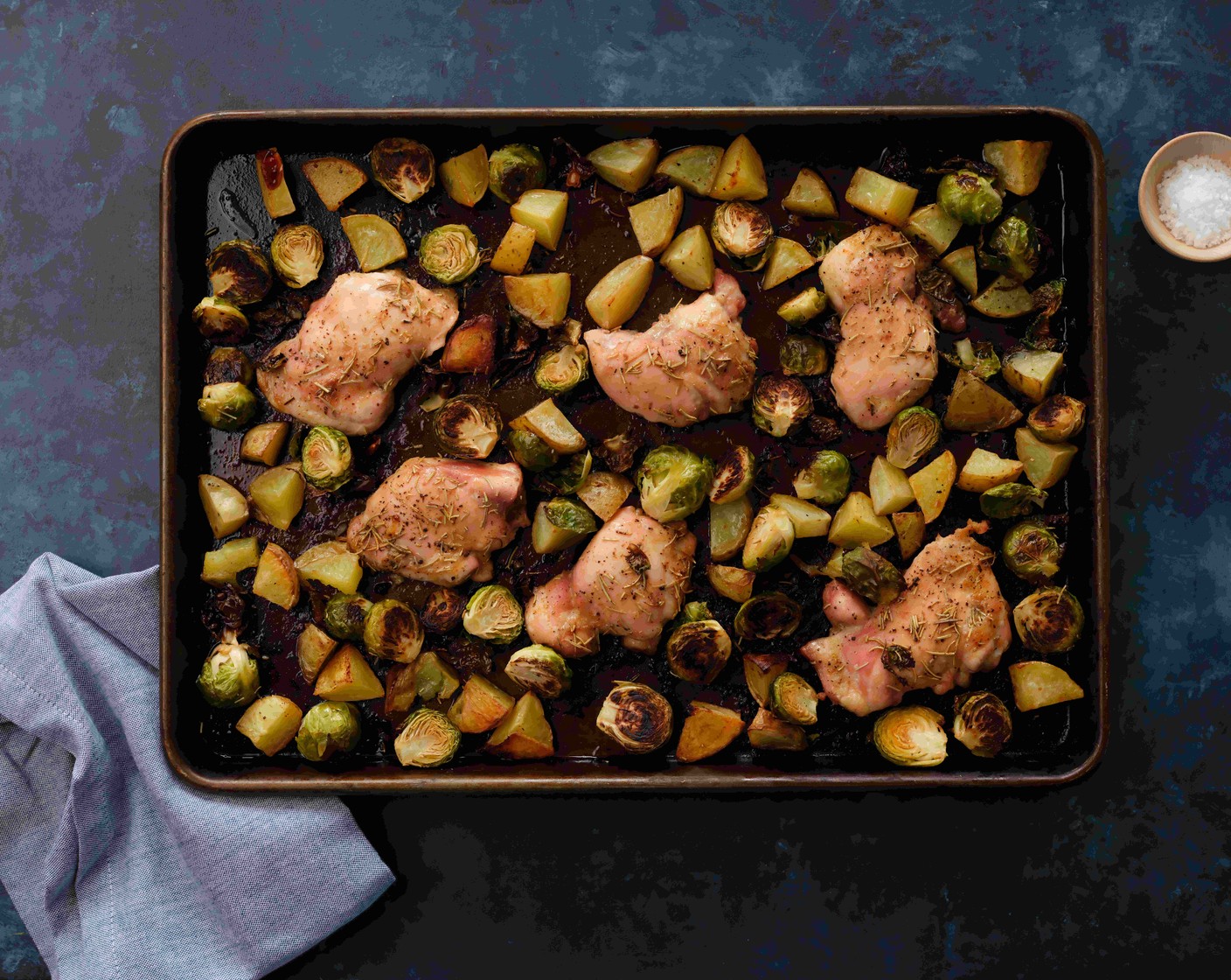 step 6 When the chicken and potatoes reach the 15-minute mark, put the Brussels sprouts in the oven. Roast for 10 to 15 minutes until the veggies are lightly browned and the chicken has reached an internal temperature of 165 degrees F (74 degrees C), then serve.
