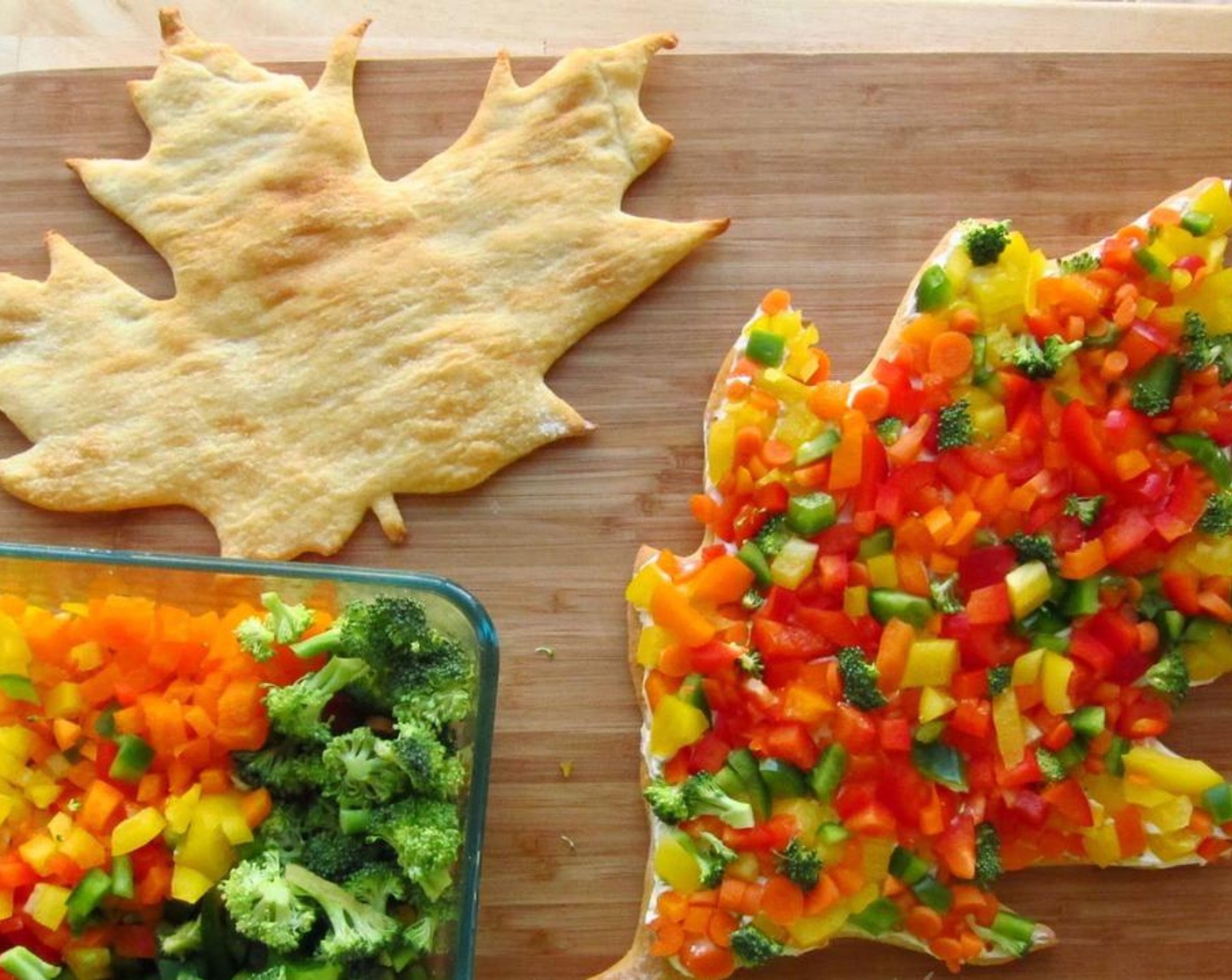 step 5 Spread Garden Vegetable Cream Cheese (1/2 cup) on the leaf and sprinkle with Mixed Vegetables (1 cup) until the leaf is fully covered.