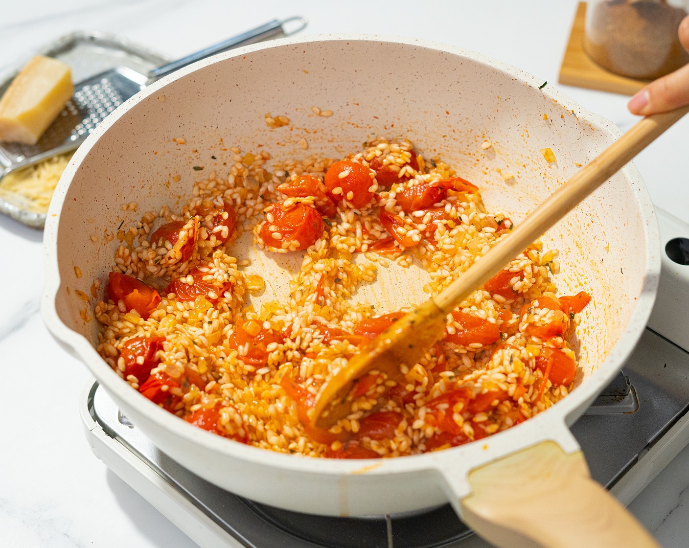 step 4 Add the Arborio Rice (1 1/2 cups) and cook until the liquid is absorbed and the rice starts to toast.