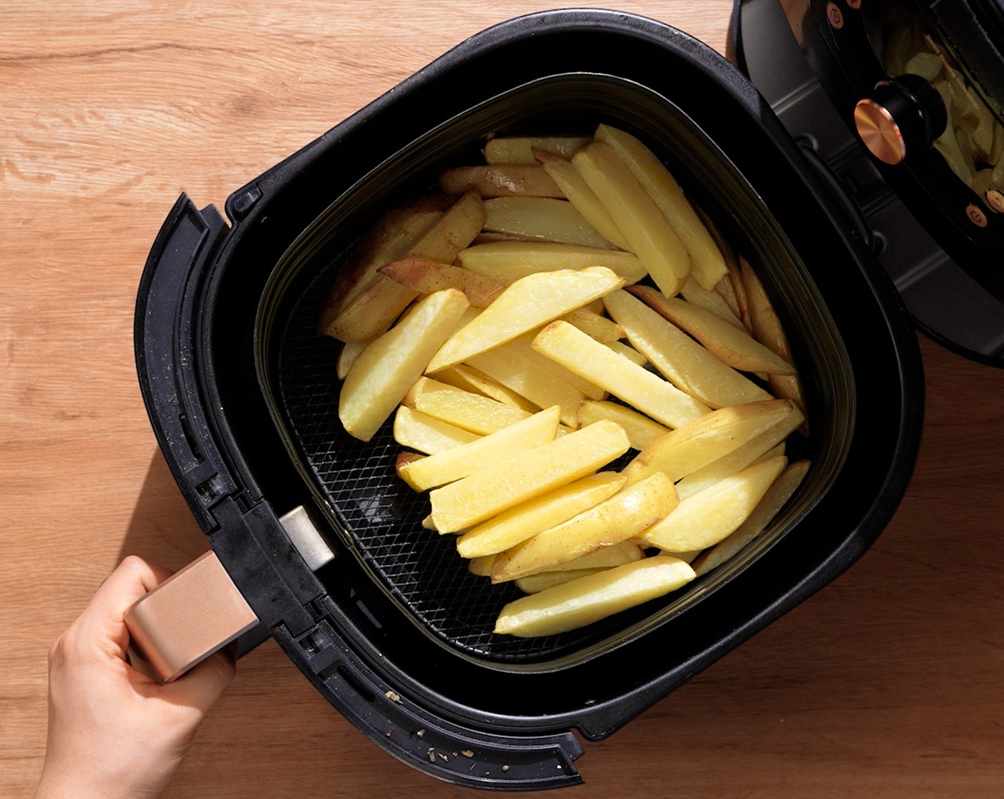 step 5 Place potatoes into an Air-Fryer basket. Air fry at 350 degrees F (180 degrees C) for 12-15 minutes. Give it a shake halfway through.