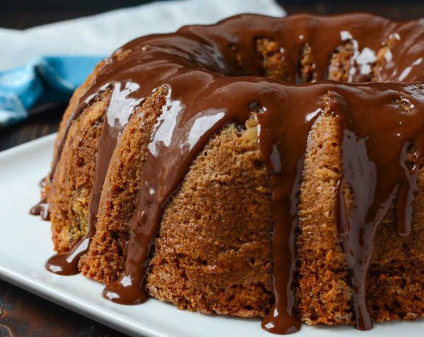 step 12 Invert the cake onto a cake plate or pedestal. Spoon ganache over the cooled cake so that it runs over the ridges. Store cake, covered, in refrigerator for up to 3 days.