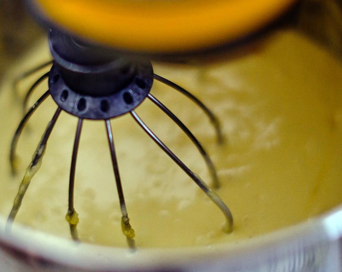 step 3 Combine Yellow Cake Mix (1 pckg), Vanilla Extract (1 tsp), Eggland's Best Classic Eggs (4), Milk (1/2 cup), Vegetable Oil (1/2 cup) and Dark Spiced Rum (1/2 cup)  in a large mixing bowl, and beat for 2 minutes on high with an electric mixer.