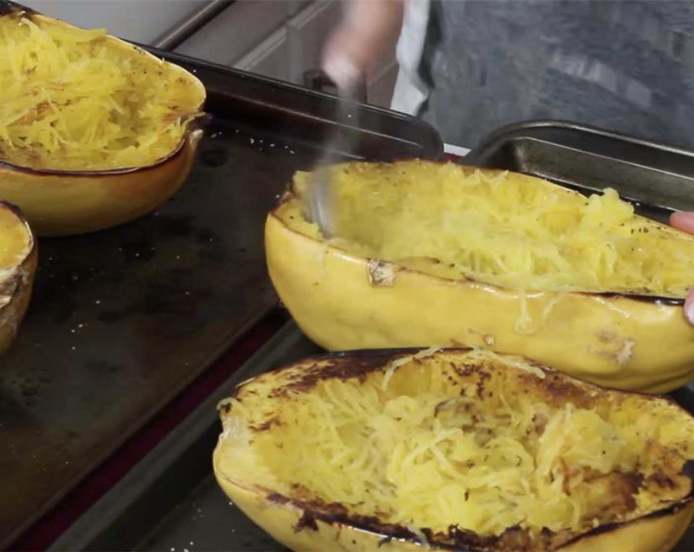 step 15 Using a fork, gently scrape the flesh off of the roasted squash. Keep a bit of border so that the squash will keep its shape for when you serve.