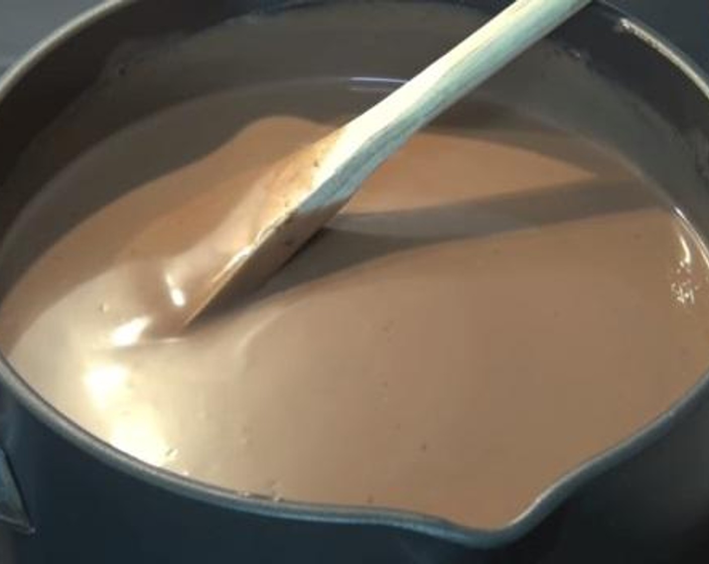 step 2 In a sauce pan over low heat, mix together the Whipping Cream (3 1/3 cups), and Nutella® (1 2/3 cups). Then, Add in the gelatin mixture and mix everything well to combine.