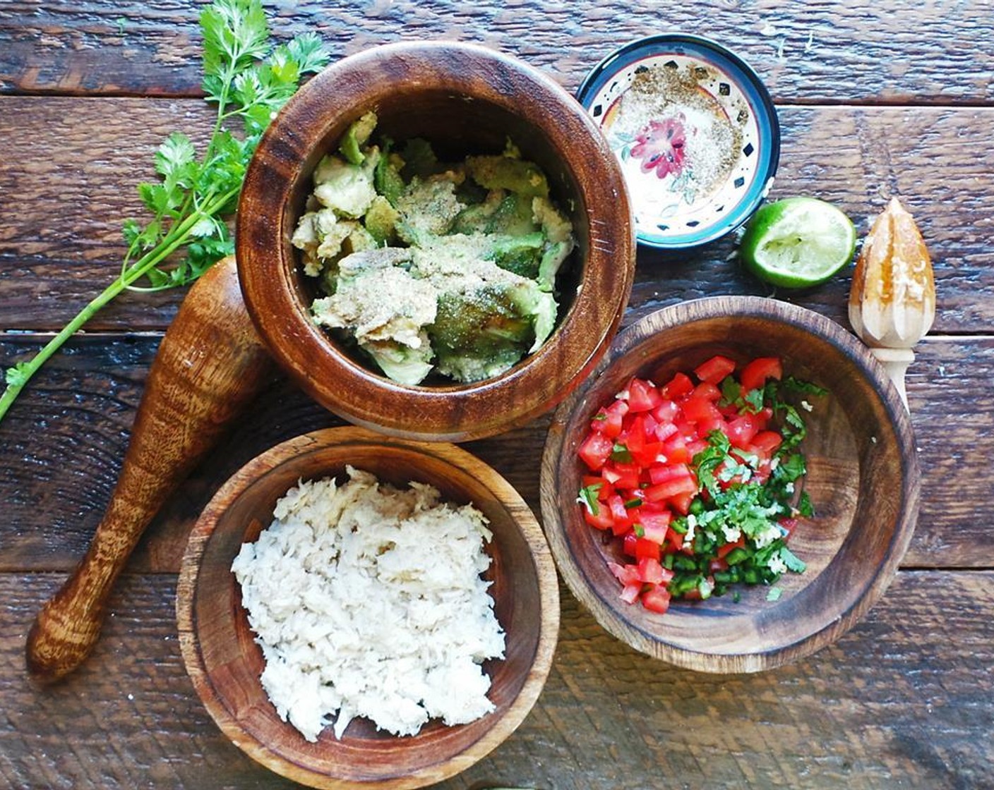 step 2 Add the tomatoes, Red Onion (1/2), Garlic (1 clove), Fresh Cilantro (1 Tbsp), and Jalapeño Pepper (1/2) to a bowl. Mix and set aside.