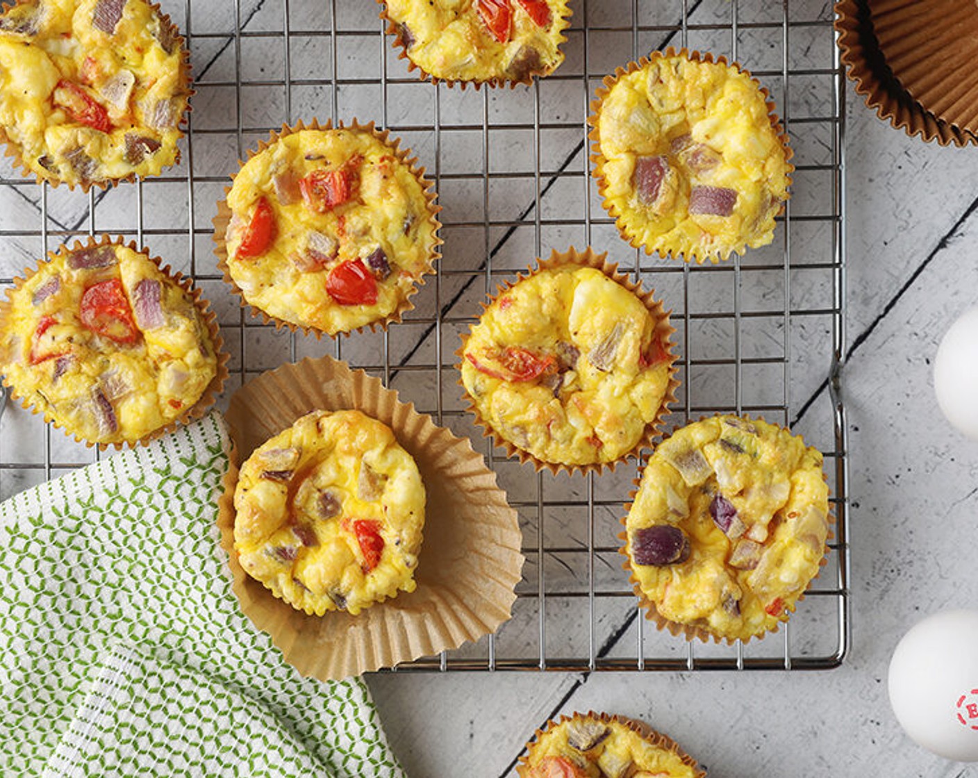 step 5 Bake until the egg mixture is set, 20 to 25 minutes. Let cool in the pan for 5 minutes before serving. If not serving immediately, transfer to a wire rack to cool completely before refrigerating for up to 4 days or freezing for up to 3 months.