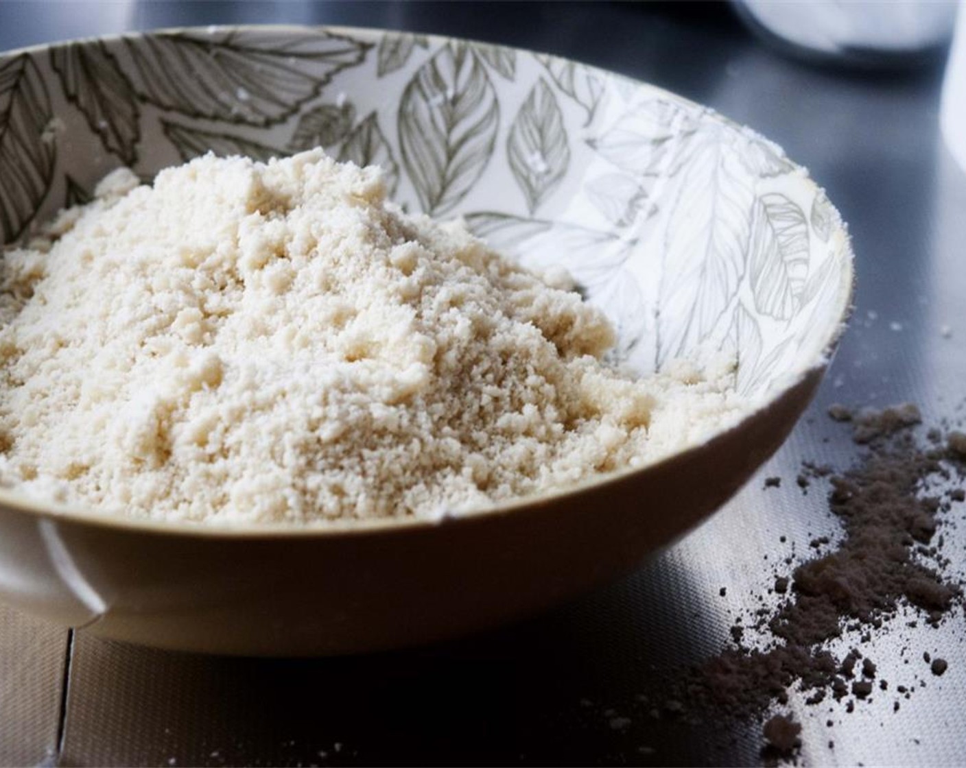 step 3 Using your hands, break the shortening into the flour until it resembles cornmeal.