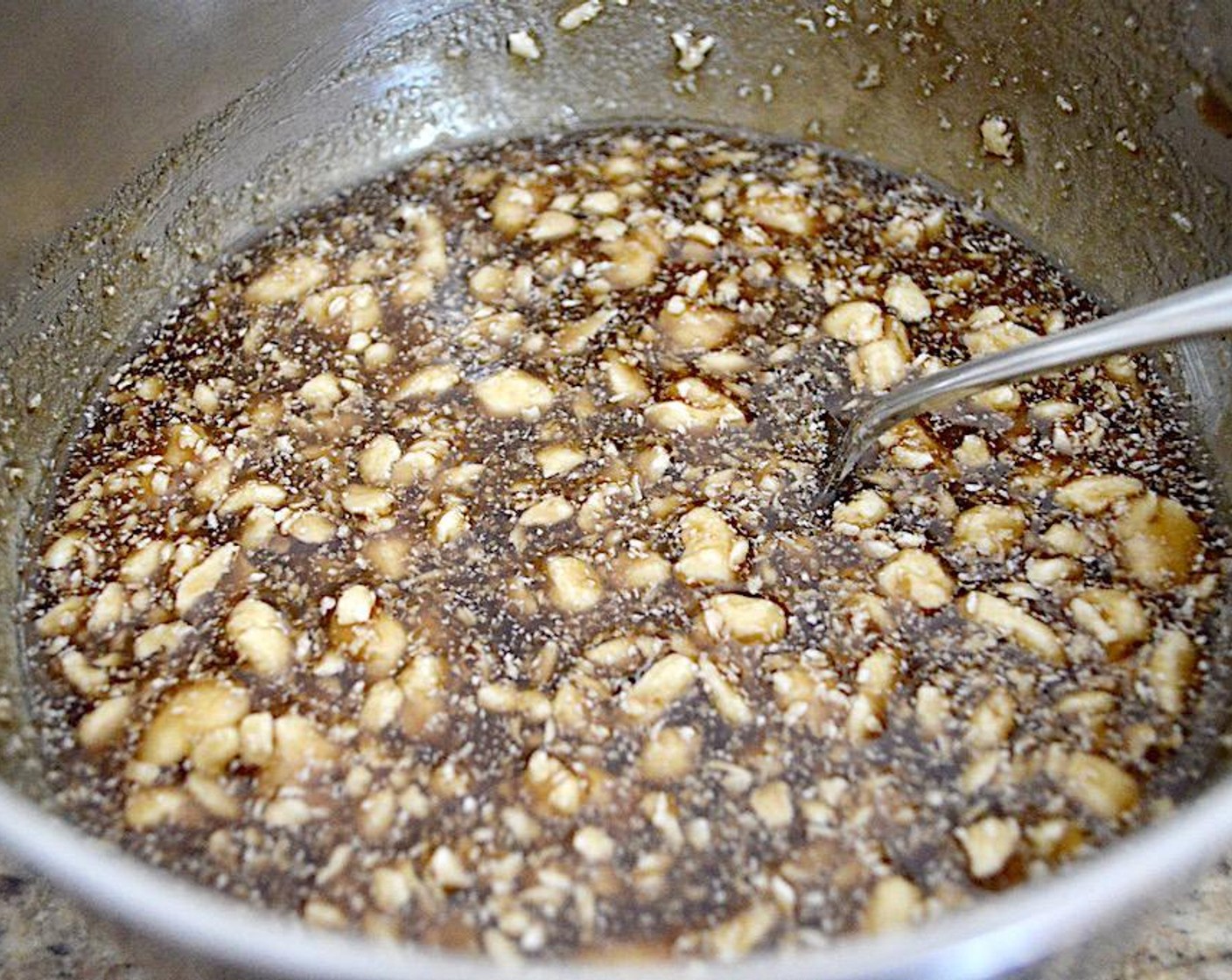 step 5 For the glaze, stir the Butter (1/2 cup), Dark Brown Sugar (1 cup), Maple Syrup (3/4 cup), and Water (1/4 cup) together thoroughly. The butter should be broken up but not melted in.