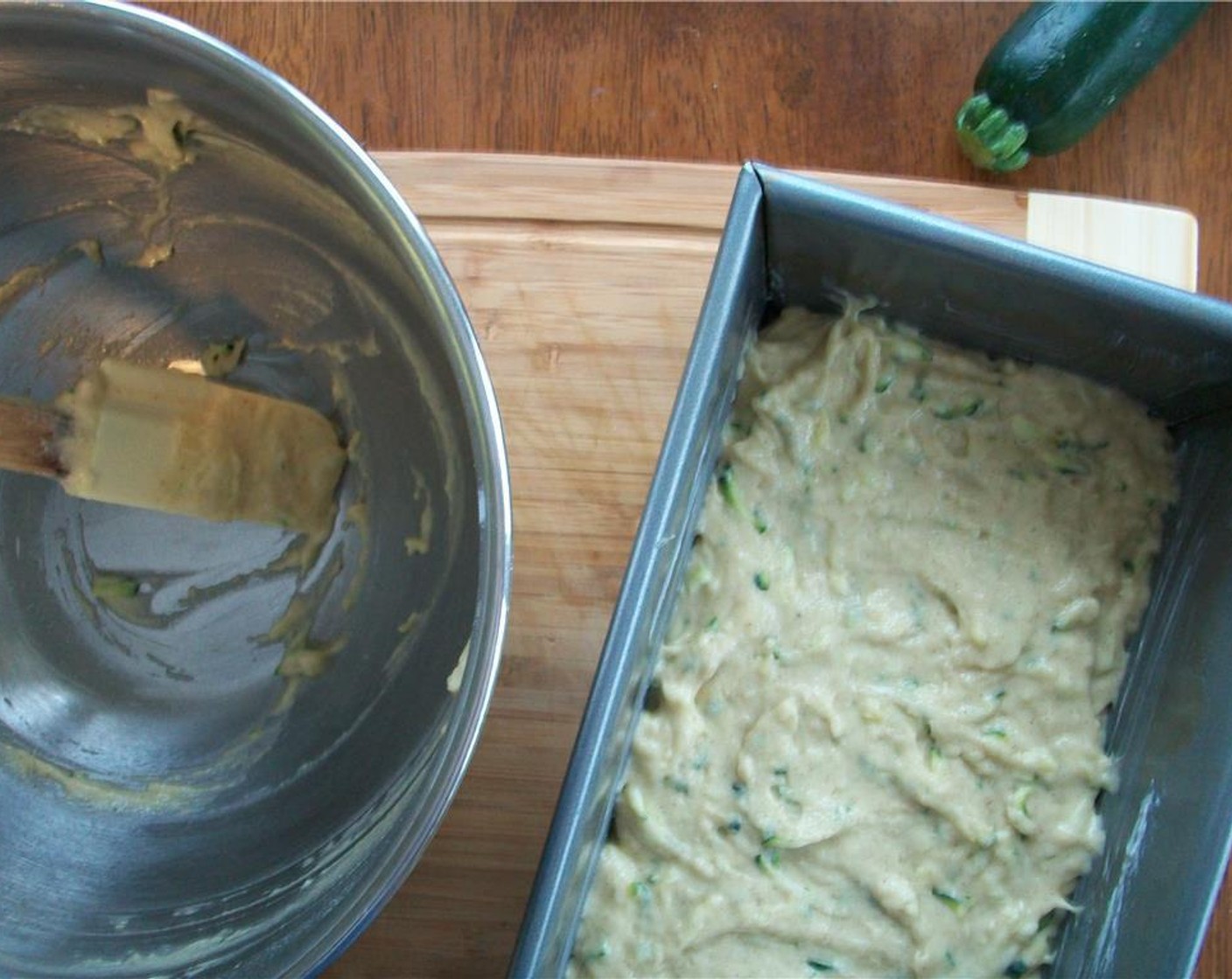 step 4 Add the flour mixture to the zucchini mixture and stir just until incorporated. Pour batter into a well greased loaf pan.