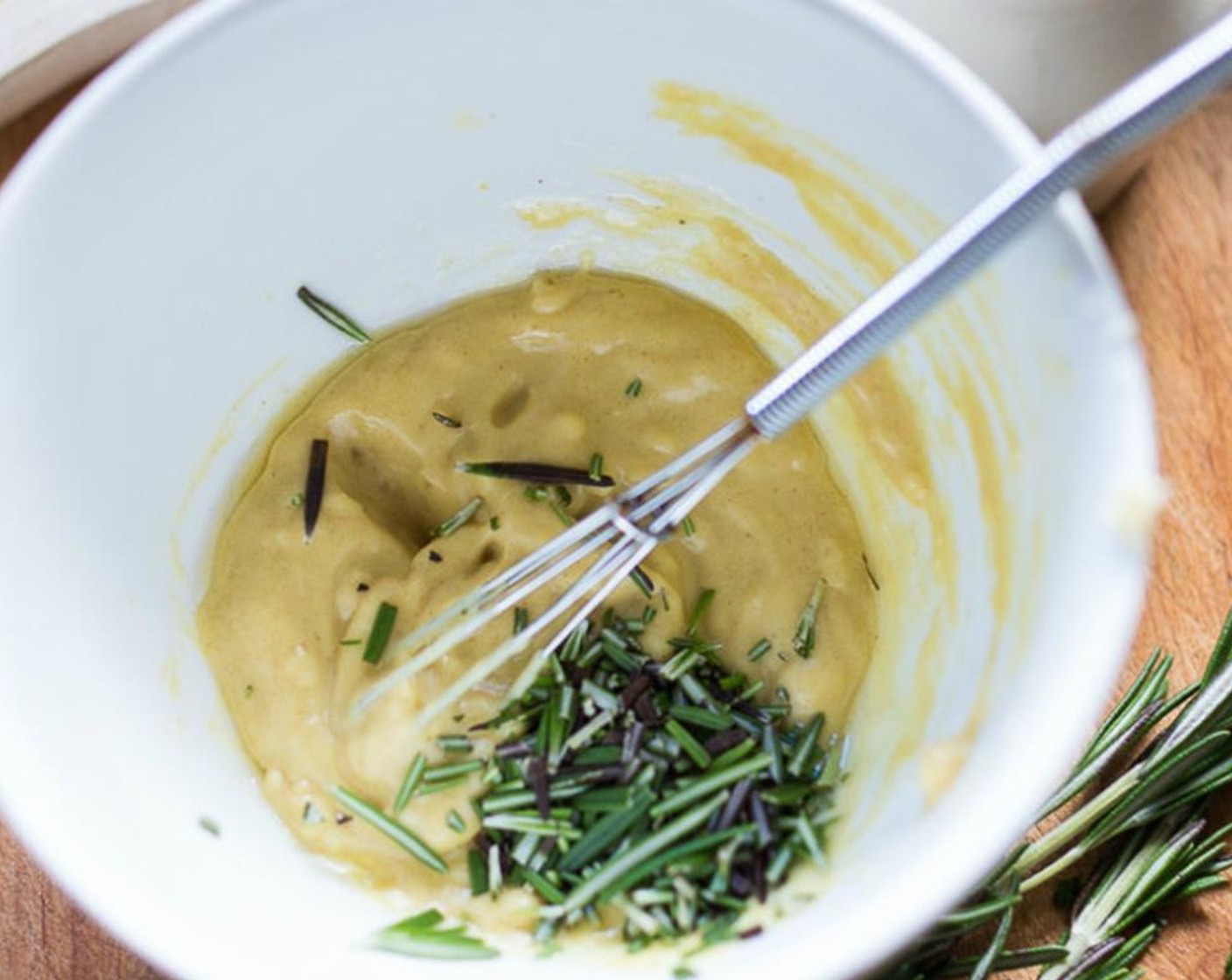 step 6 In a small bowl, mix Dijon Mustard (1/4 cup), Olive Oil (1/4 cup), Garlic (3 cloves), Fresh Rosemary (1 Tbsp), Salt (1/2 tsp), and Ground Black Pepper (1/2 tsp) until incorporated.