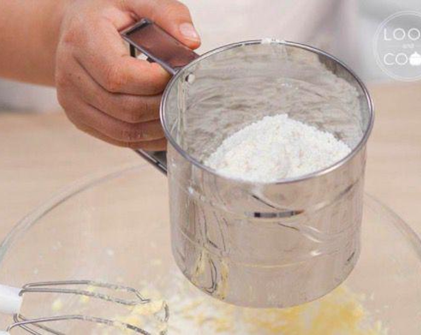 step 5 Sift All-Purpose Flour (1 1/3 cups) over the butter mixture and beat it until fully incorporated.