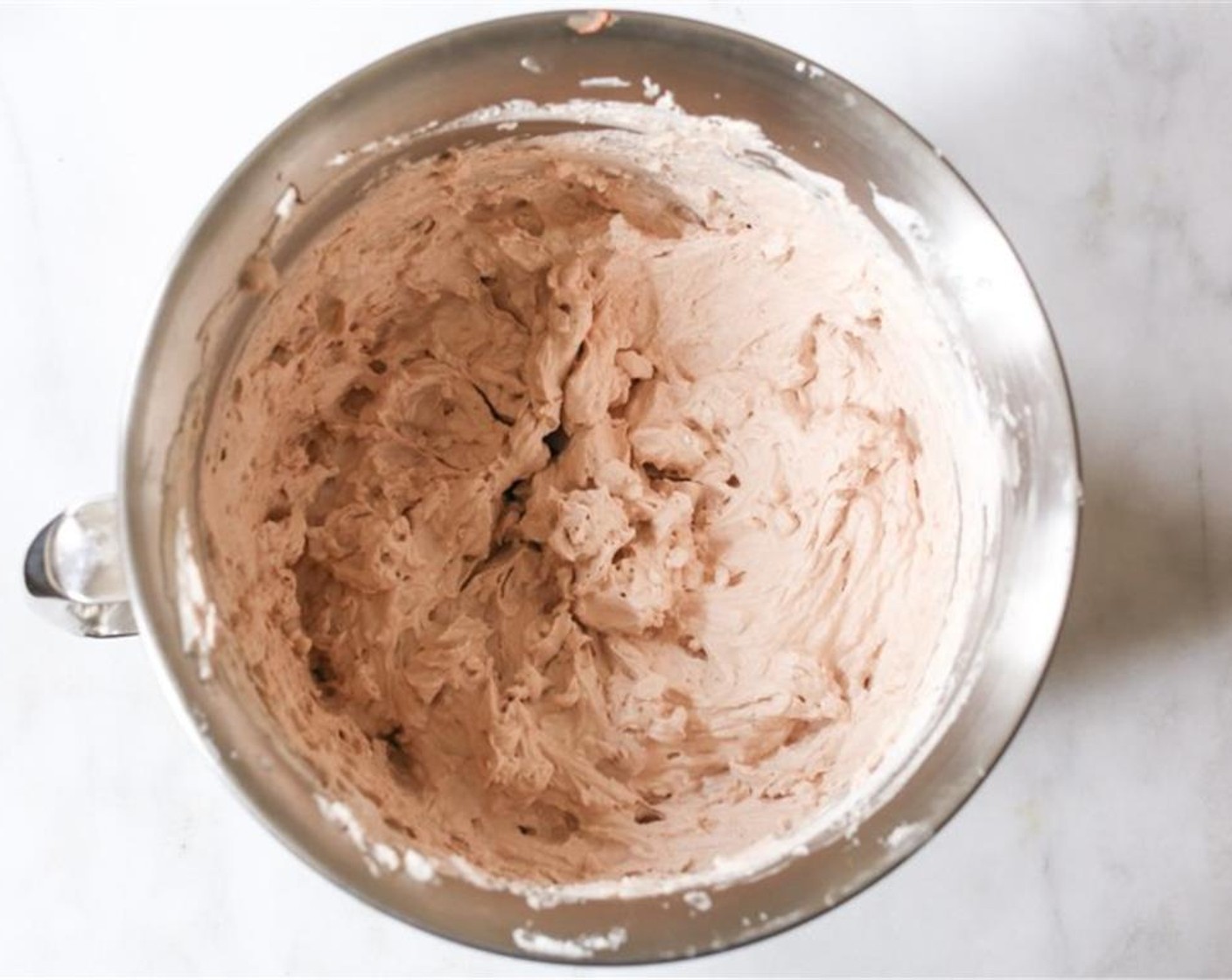 step 2 Transfer the Nutella cream cheese to the bowl of a stand mixer and add the Heavy Cream (3 cups). Mix on low speed to combine, then slowly increase the speed of medium. Mix until firm peaks form, about 4-5 minutes.