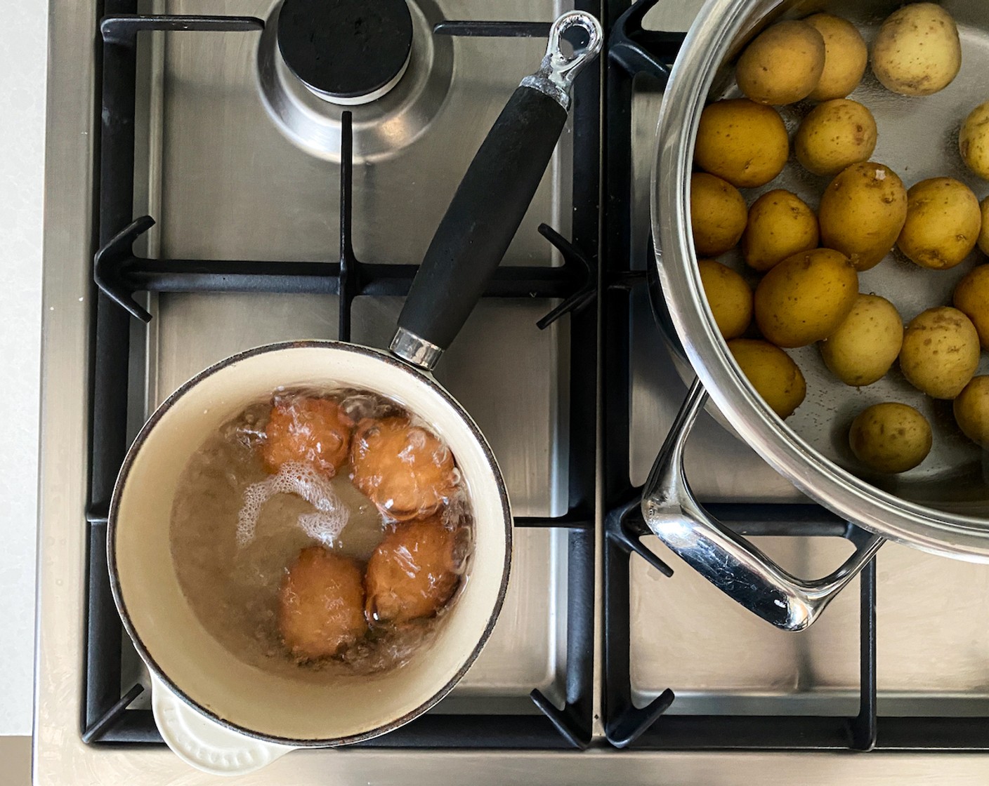 step 2 Bring a large and small pot of water to a boil. Boil the Eggs (4) for 8-10 minutes (depending on your preference).