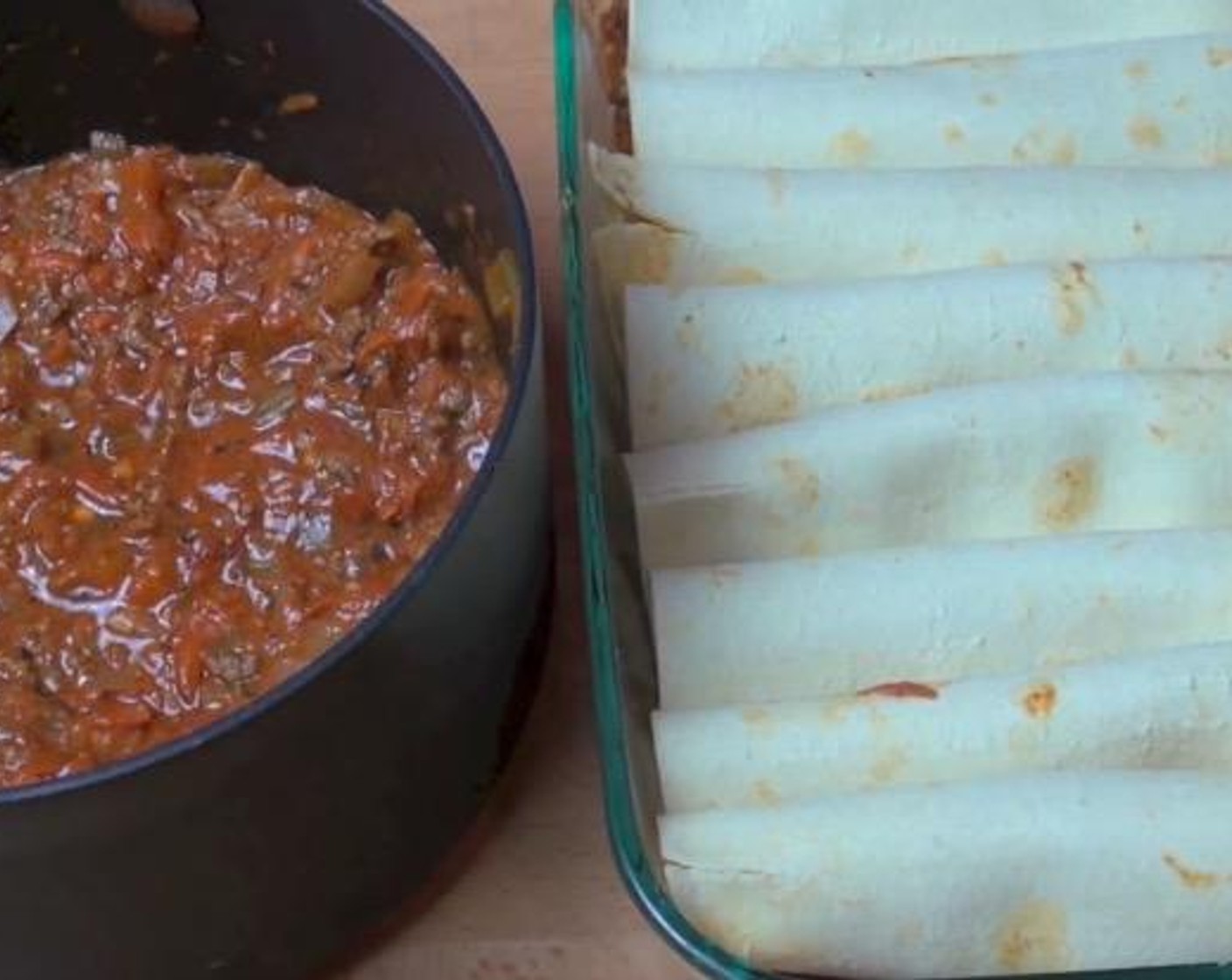 step 5 Take 1/3 cup of the meat mixture and put it along the edge of one of the Lasagna Sheets (8). Roll up the sheet and transfer it to the baking dish. Repeat until ingredients are used up.