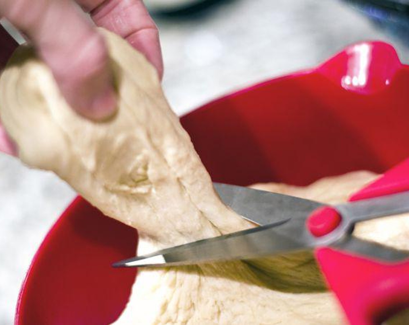 step 4 Bring Water (8 cups) to boil in a large pot, then mix in Brown Sugar (1 1/2 Tbsp). Meanwhile, portion out palm-sized dough balls, and roll each into a 6-inch rope. Join the two ends to form a bagel shape, ensuring the hole is large, about 1-2 inches.