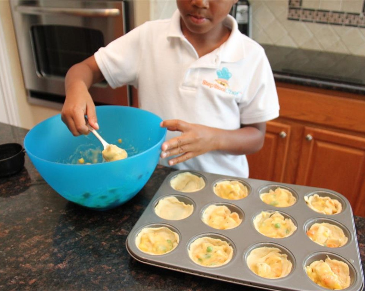 step 3 Spoon the filling mix into the cups with about 1 to 2 tablespoons per cup.