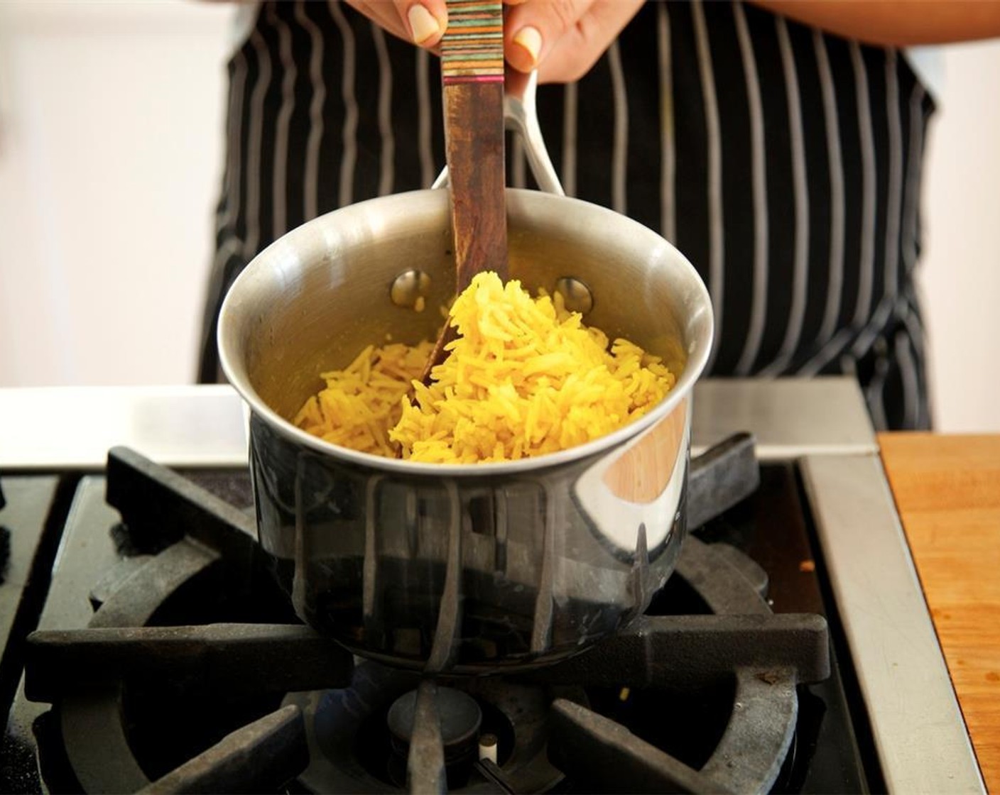 step 6 Add one cup of water, Basmati Rice (2/3 cup), and Salt (1/4 tsp). Stir. Over high heat, bring to a boil. Stir once, and reduce heat to low. Cover and simmer for ten minutes. Remove from heat, fluff rice, and keep covered until plating.