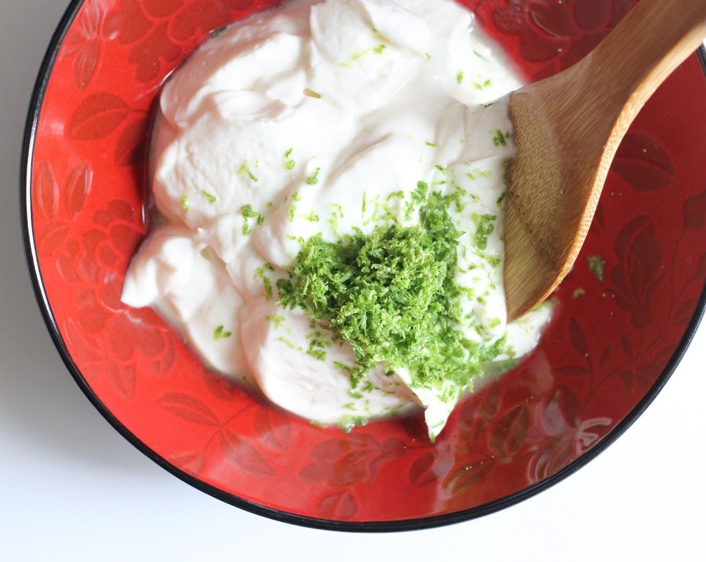 step 7 Put Vanilla Greek Yogurt (2 cups), zest and juice from Limes (2) into a bowl and mix together well.