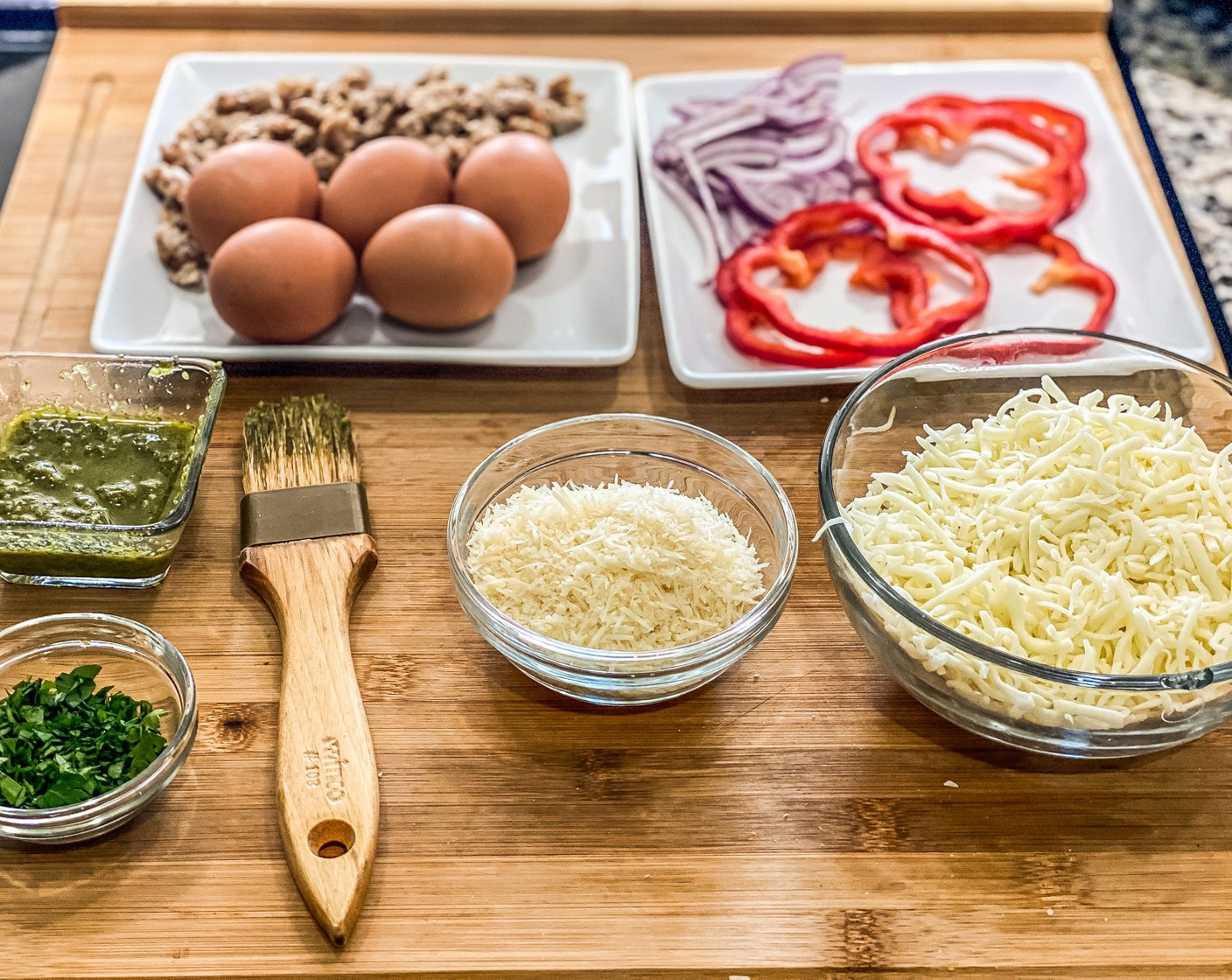 step 5 In a medium bowl blend Shredded Mozzarella Cheese (1 1/2 cups) and Shredded Parmesan Cheese (1/4 cup).