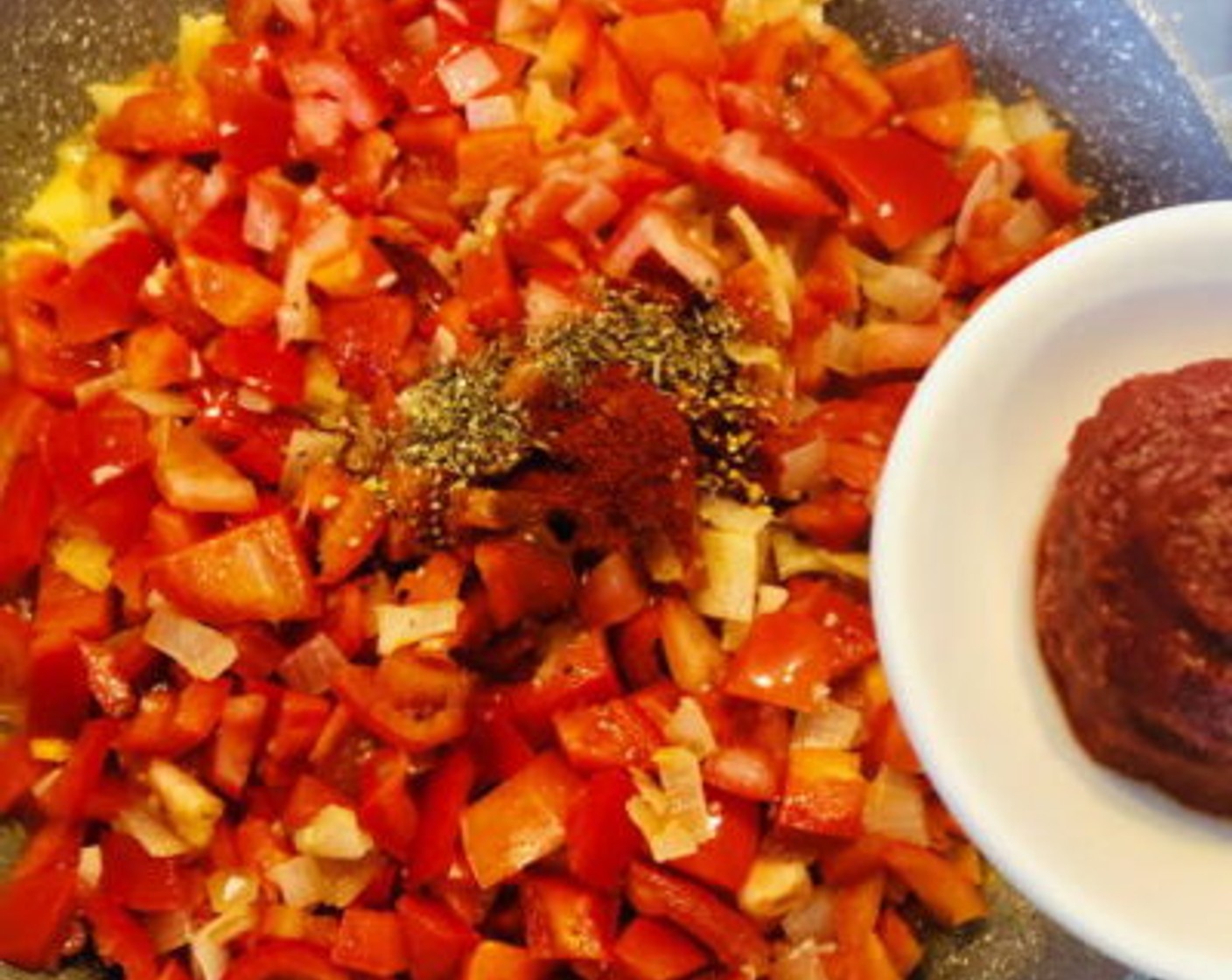step 3 Season with Salt (1 tsp), Ground Black Pepper (1/2 tsp), Smoked Paprika (1/2 tsp), Red Chili Powder (1 tsp), Crushed Red Pepper Flakes (1/2 tsp), and Dried Oregano (1 tsp) followed by adding in the Tomato Paste (1 Tbsp). Adjust the spice level and heat as per your taste (more or less depending on what you like).