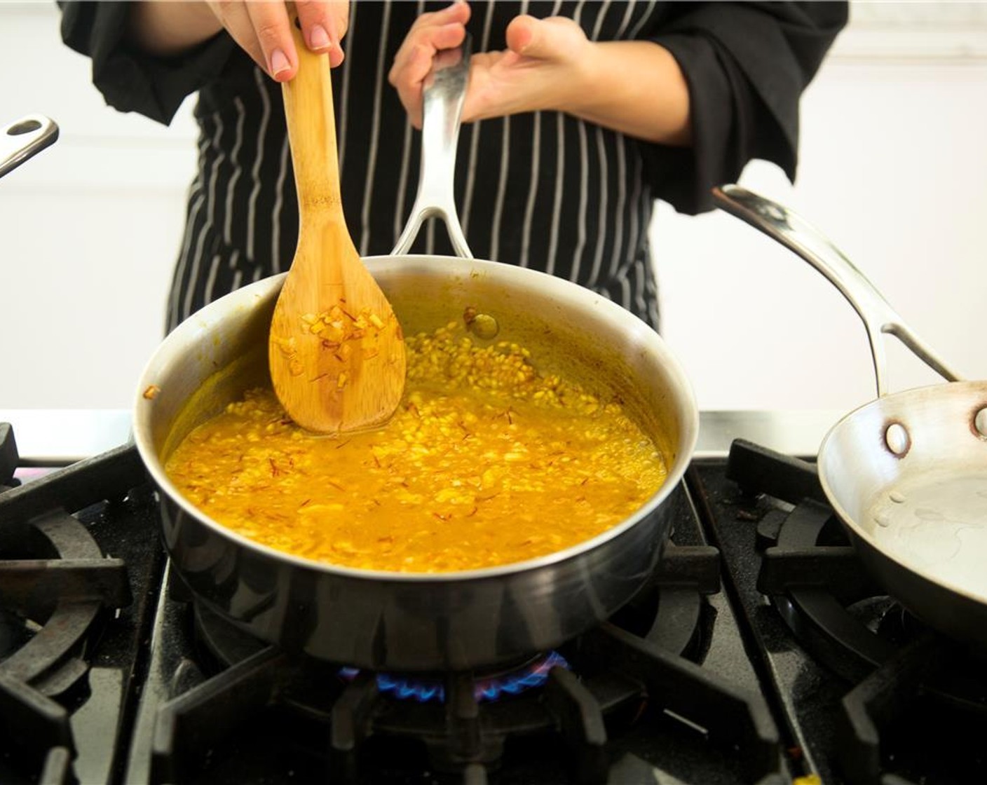 step 7 Add Arborio Rice (1 cup) to pot and toast for 3 minutes, stirring often.