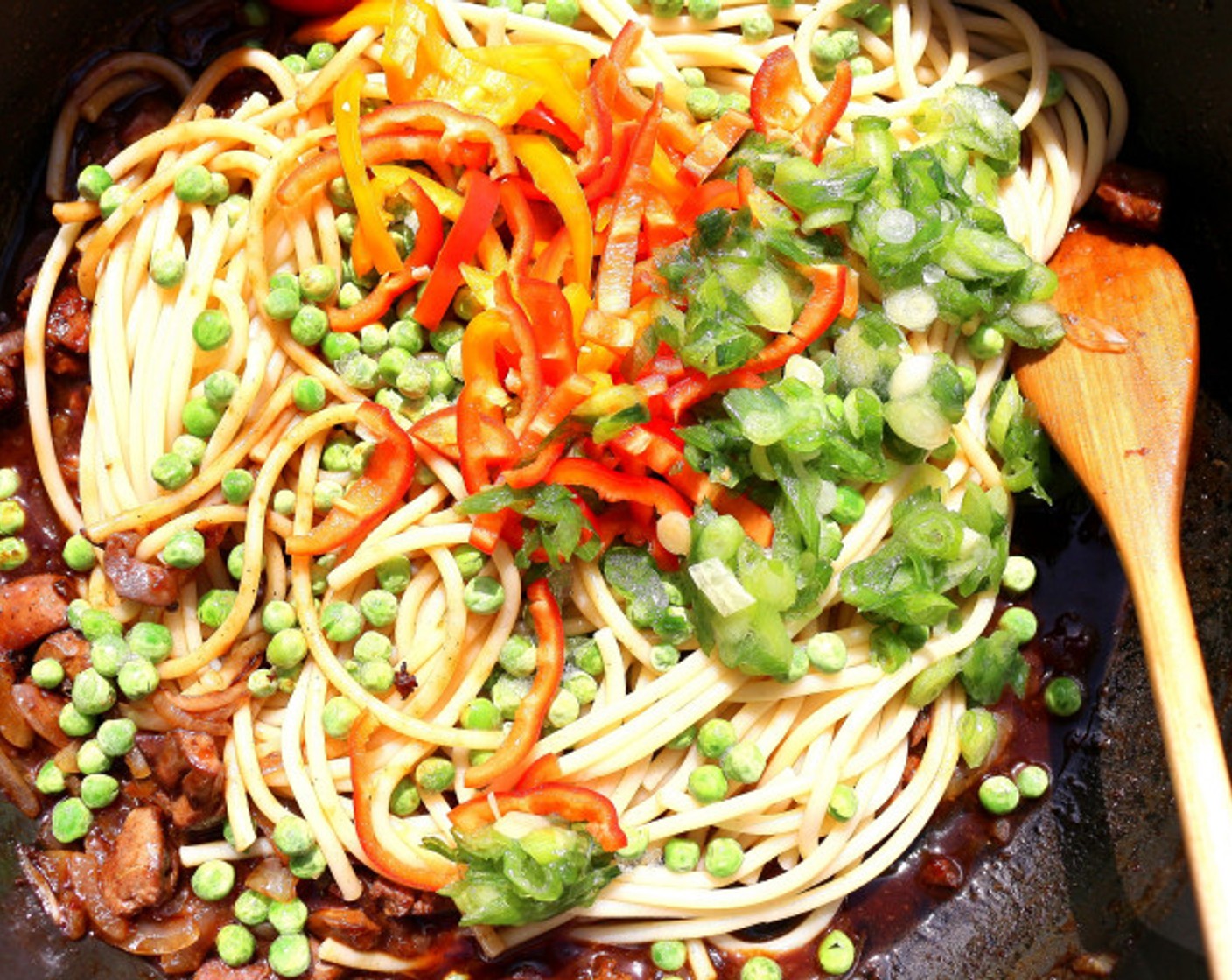 step 10 Add Noodles (8 oz) of your choice, add Green Peas (3/4 cup), Bell Pepper (1/2) and Scallions (4 stalks), mix well, check and adjust seasoning.