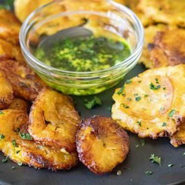 Dominican Green and Yellow Fried Plantains with Mojo Sauce Recipe | SideChef