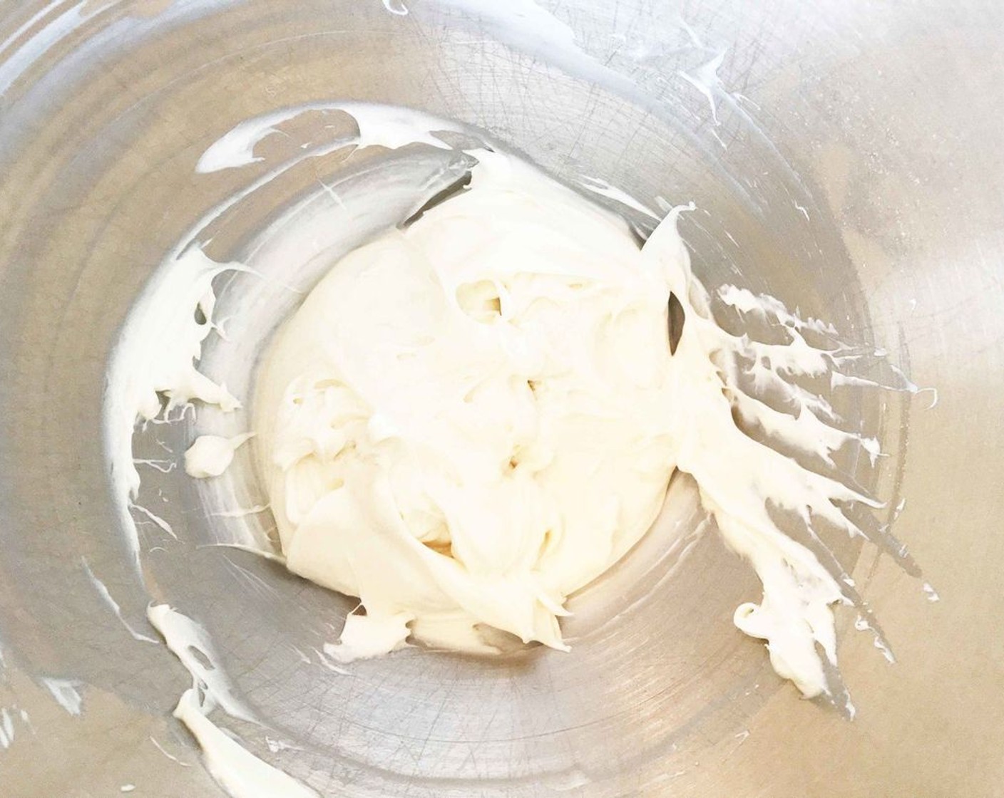 step 9 While the cake is cooling, beat together the Cream Cheese (1 cup), Powdered Confectioners Sugar (1/2 cup), Fat-Free Vanilla Greek Yogurt (1/3 cup), Swerve Confectioners Sugar Replacement (1/4 cup), and Vanilla Extract (1 tsp) until smooth and creamy.