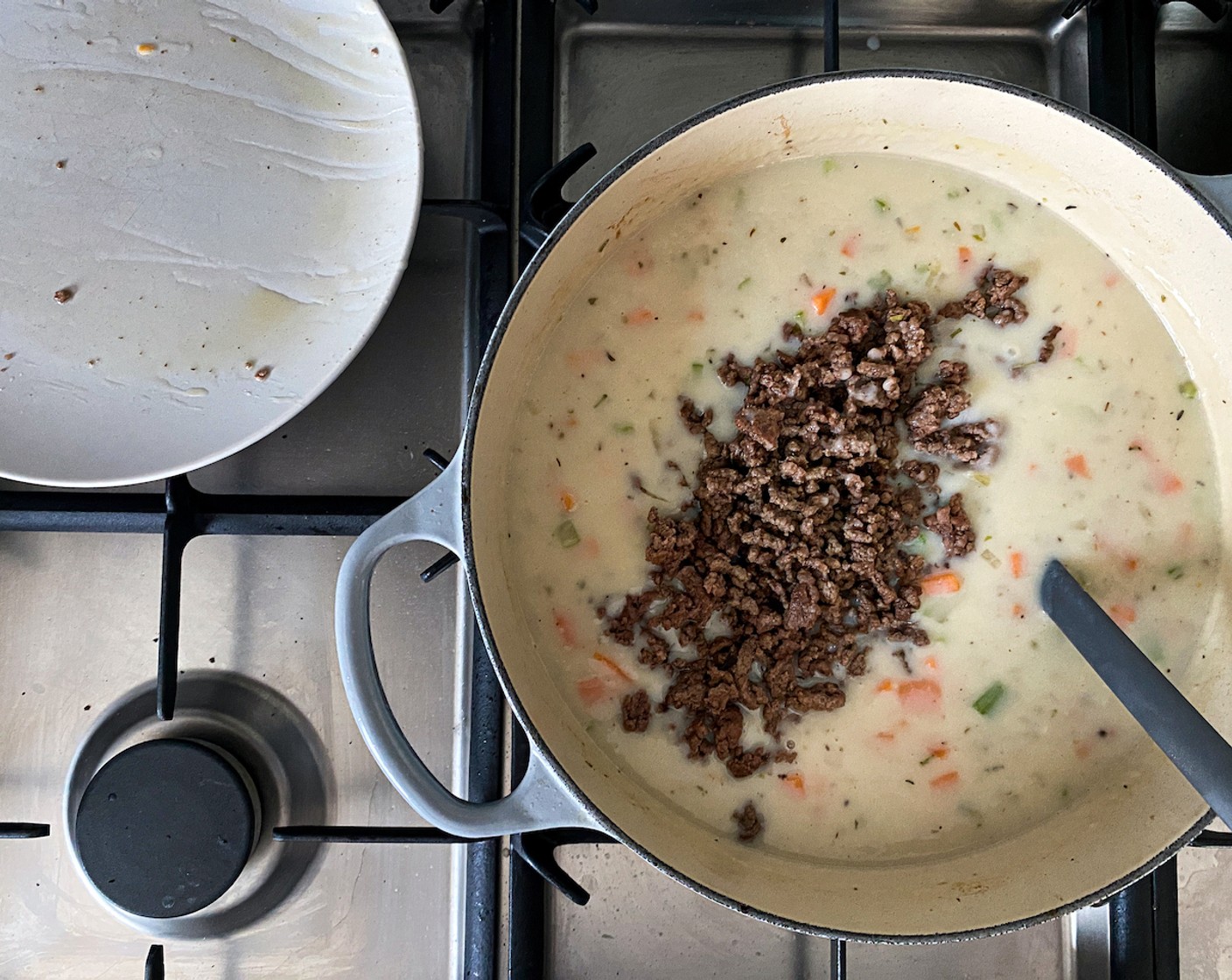 step 6 Add the potato. Add mince and simmer until potatoes are tender for about 15 minutes.