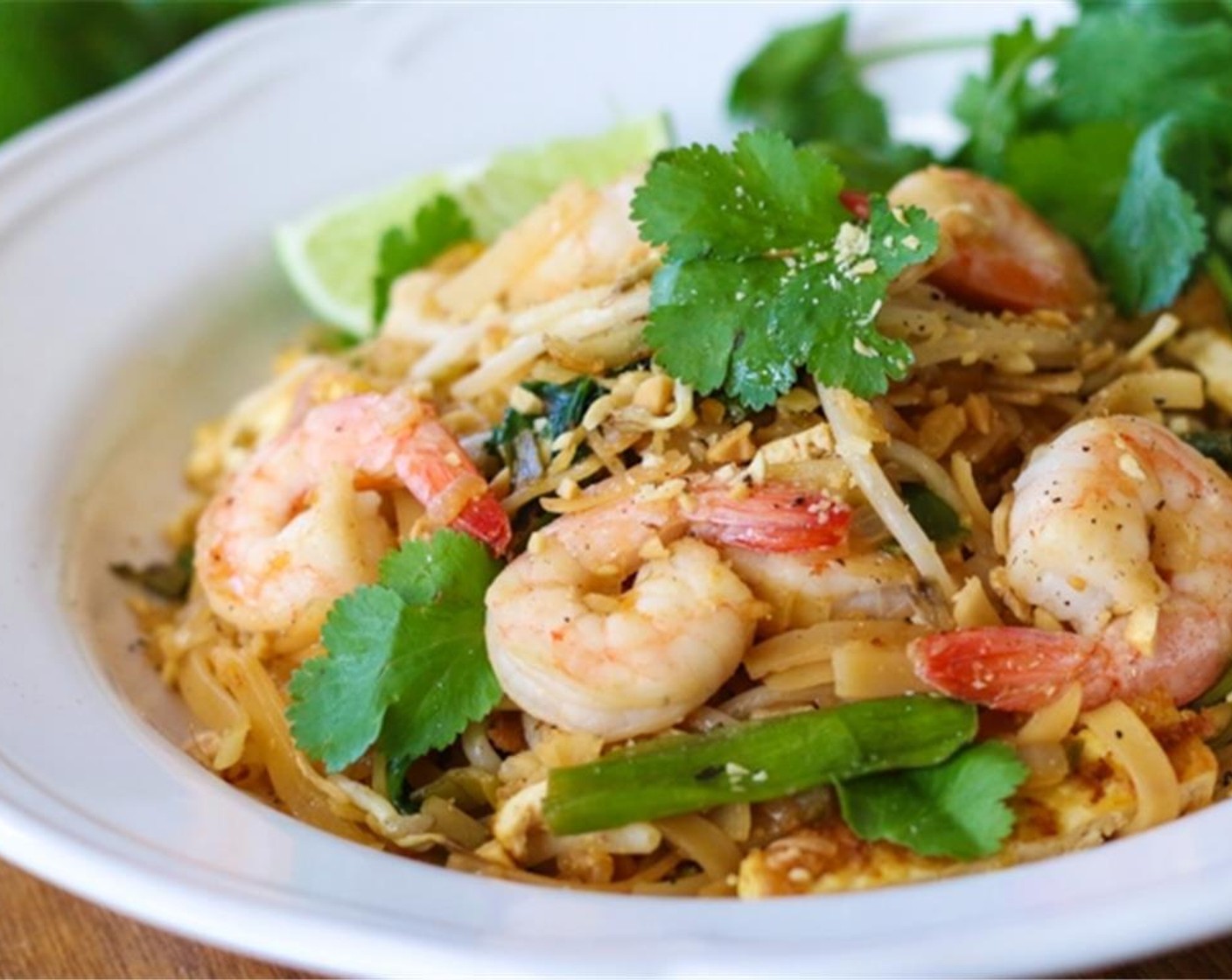 step 20 Top with more bean sprouts, cilantro and peanuts. Serve with wedges of Limes (to taste).