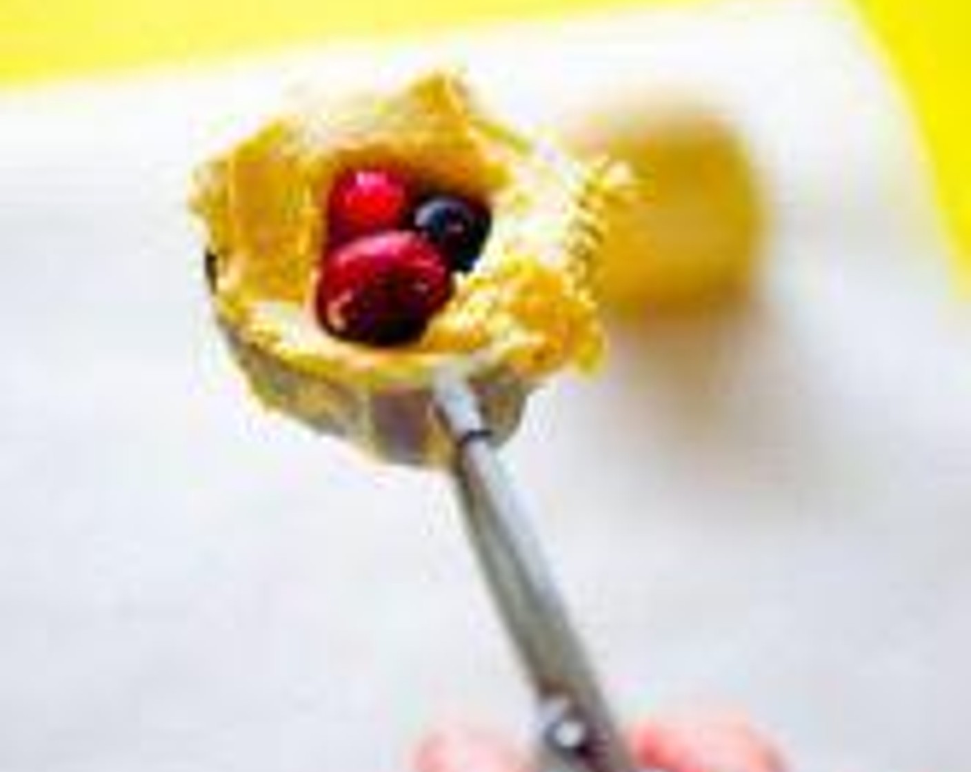 step 4 While cookies bake, use an ice cream scoop to scoop Vanilla Ice Cream (6 scoops). Working quickly, use your finger to make a small hole in the ice cream, fill with Fresh Mixed Berries (4 Tbsp), then cover with more ice cream to seal.