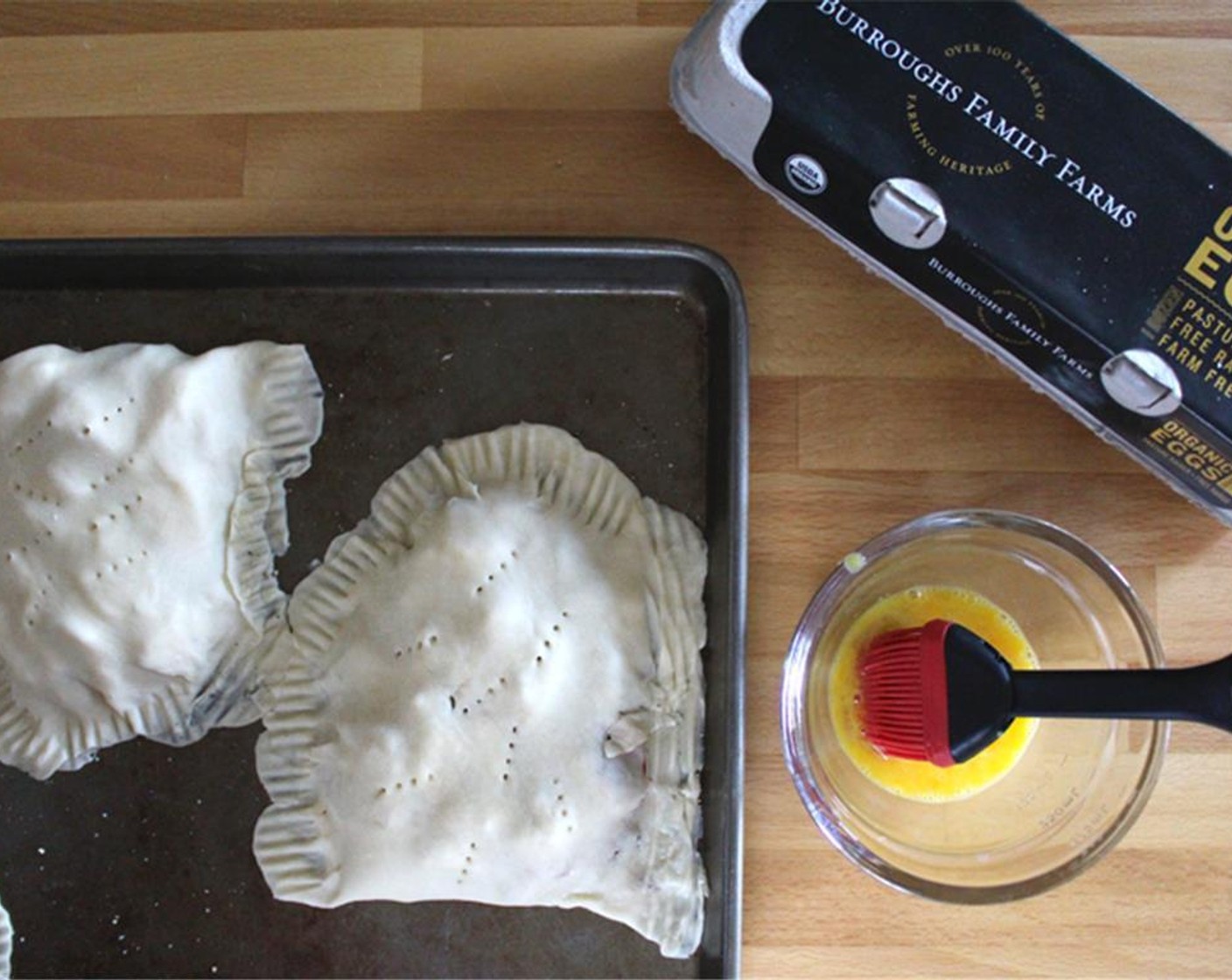 step 10 Fold the non-topped side of the crust over the fish and veggies. Press edges down and crimp to seal with a fork. Pierce the top a few times with the fork.