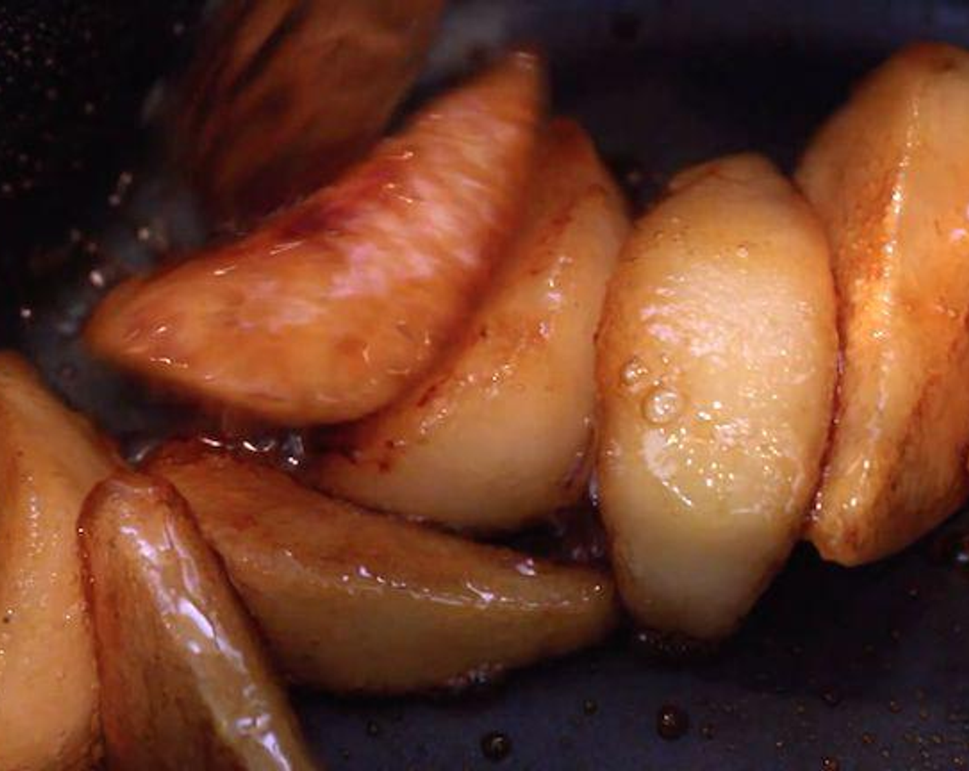 step 4 Peel the Pears (4) take out the core. Slice into eighths and put the Caster Sugar (1/4 cup) onto a plate. Coat the pears with sugar. Put into a hot frying pan to caramelise. This should take around 5 minutes.