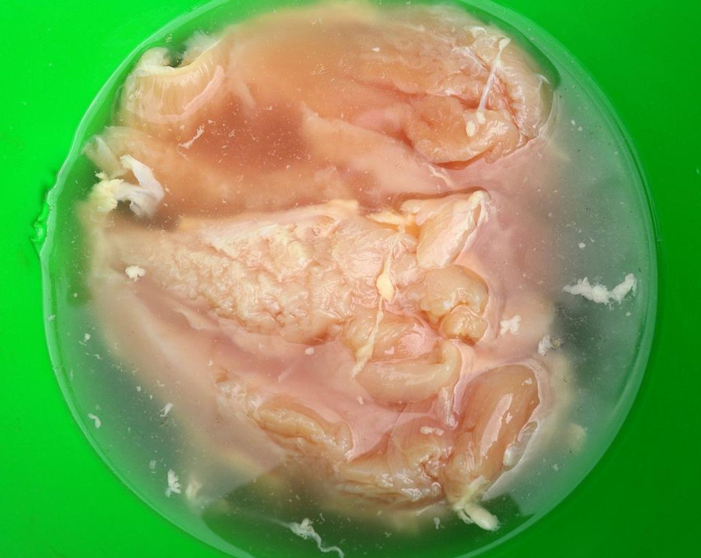 step 1 Brine Capon Breasts (2) overnight. For the brine mix Salt (1/4 cup) and Granulated Sugar (1/4 cup) in Water (6 cups), stir until the salt is dissolved, add the chicken breasts and refrigerate overnight.