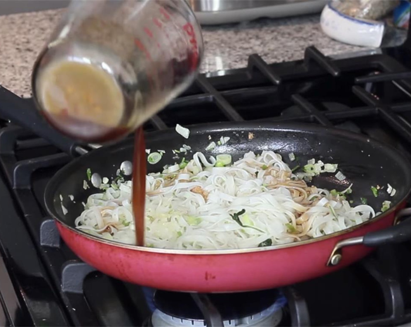 step 15 Pour the soy sauce mixture and toss until everything is absorbed and there is no liquid left in the pan. Keep heat low so you do not overcook the noodles, If the noodles get too soft, they will start to break. Push the noodles to one side of the pan.