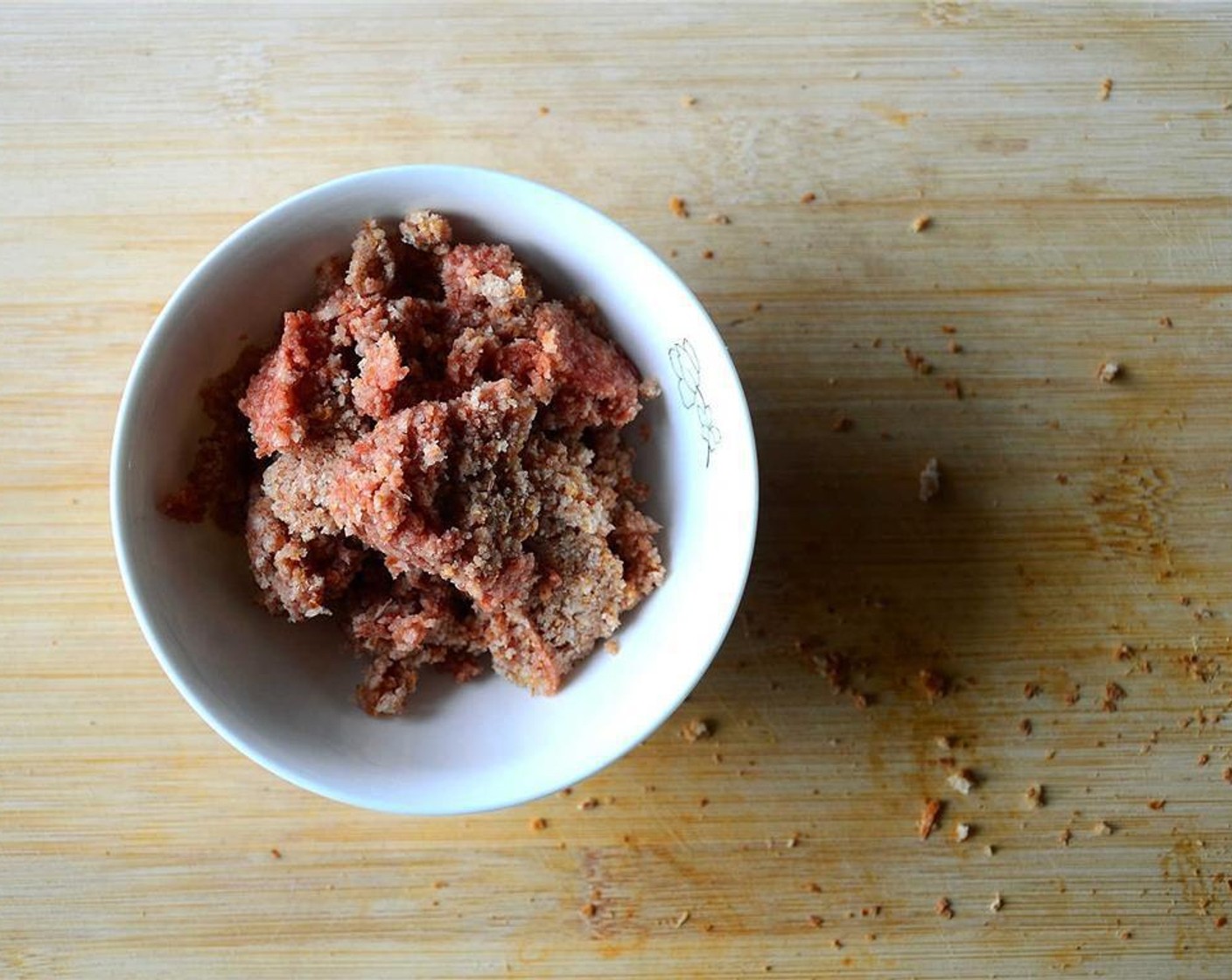 step 6 Add the Canned Tomato Purée (1/2 Tbsp), and pulse briefly to combine. Transfer the mixture to a bowl.