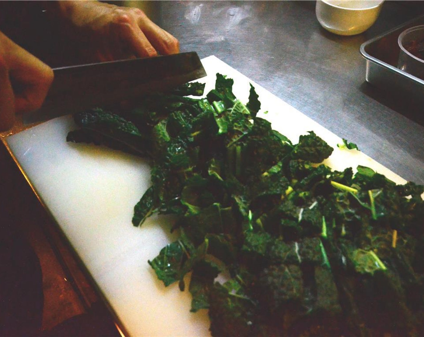 step 7 As the onions caramelize, roughly chop the Tuscan Kale (13 1/2 cups).