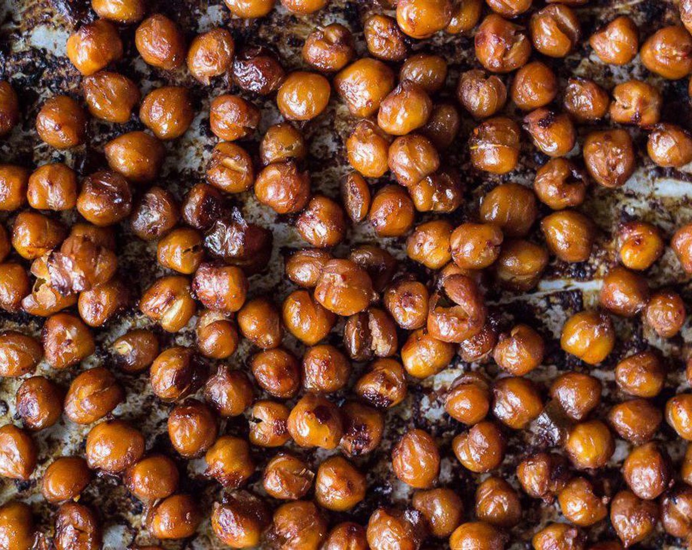 step 4 Spread chickpeas on baking sheet and roast for 30 minutes, tossing the chickpeas every 10 minutes so they roast evenly.