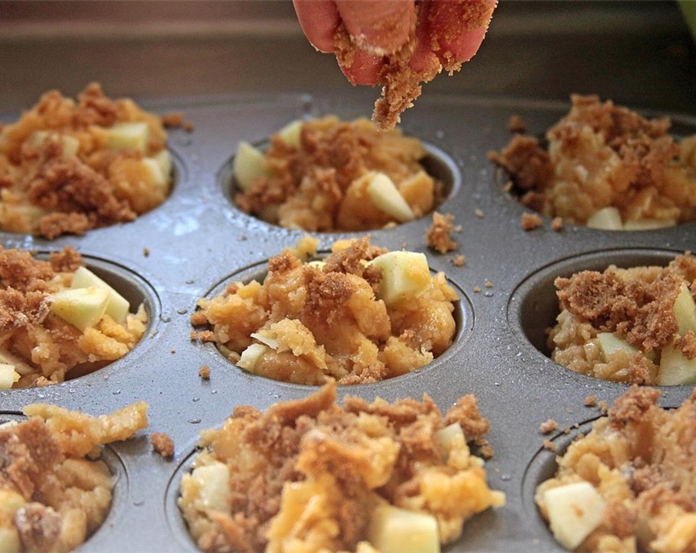 step 10 Combine Brown Sugar (1/3 cup), All-Purpose Flour (1 Tbsp), Simply Organic Cinnamon, Ground (1/4 tsp), and 1 1/2 tablespoons of butter, and sprinkle over batter.