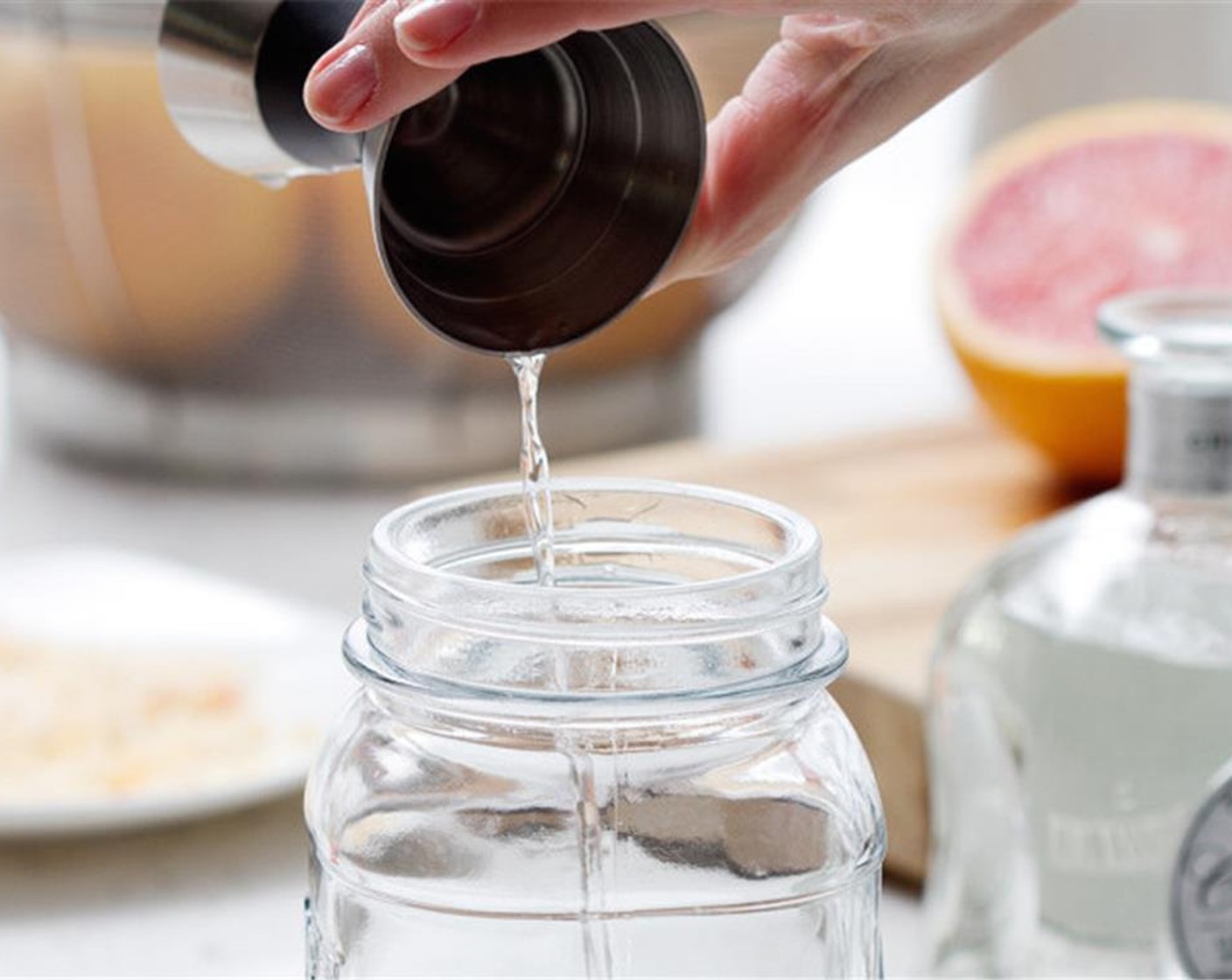 step 3 Fill a cocktail shaker with ice. Add Casa Noble® Tequila (4 fl oz), grapefruit juice, Simple Syrup (2 fl oz), and Orange Liqueur (0.5 fl oz). Stir until mixed and chilled, about 30 seconds.