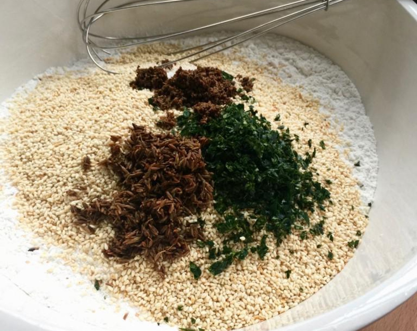 step 5 Then place the roasted murukku mix, Sweet Glutinous Rice Flour (1 2/3 cups), Rice Flour (2/3 cup), Ajwain Seeds (1 Tbsp), Cumin Seeds (1 Tbsp), and White Sesame Seeds (1/2 cup) in a large mixing bowl. Stir to mix everything together.
