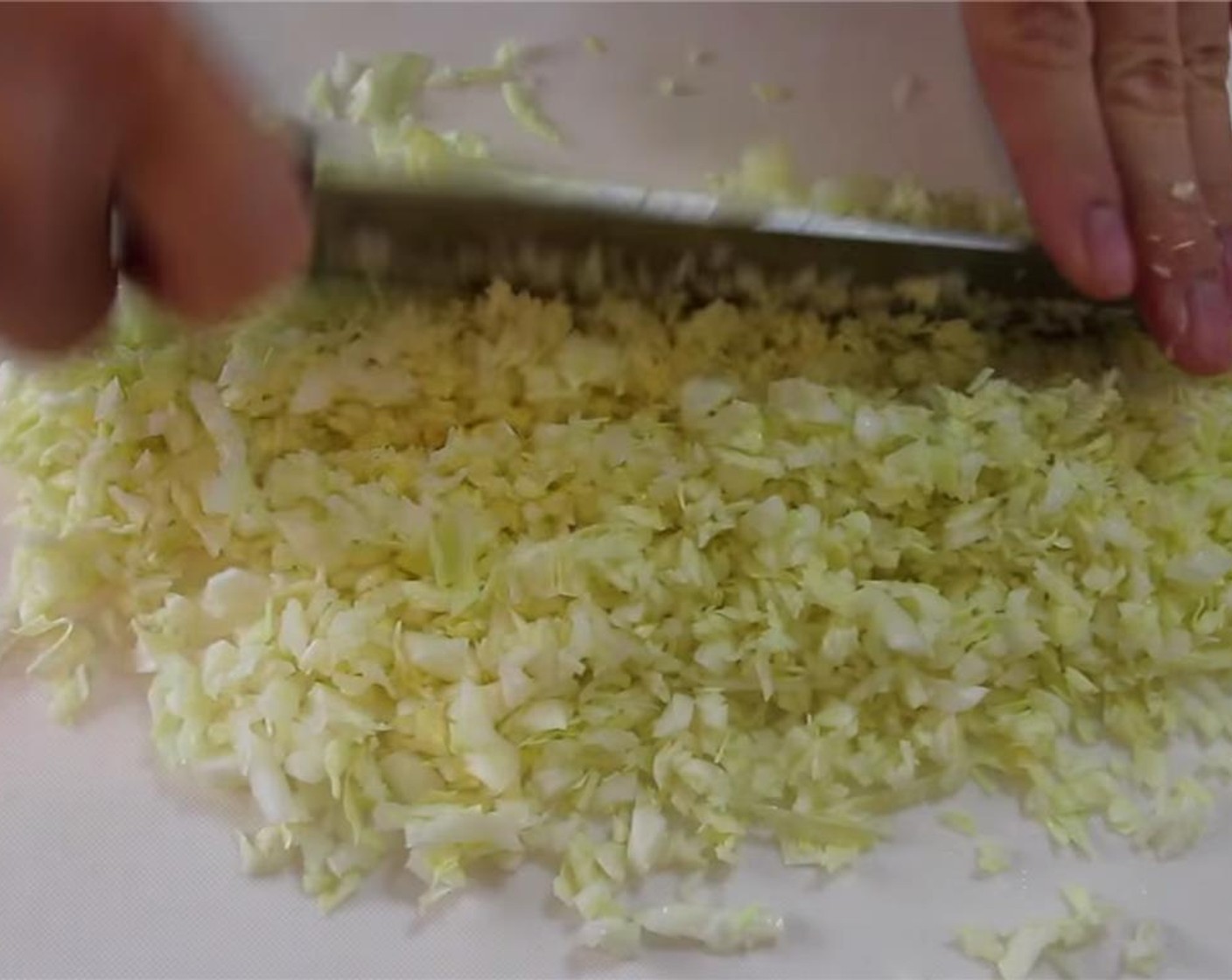 step 2 Chop the Green Cabbage (7 oz) into fine pieces about 1/8-inches thick.