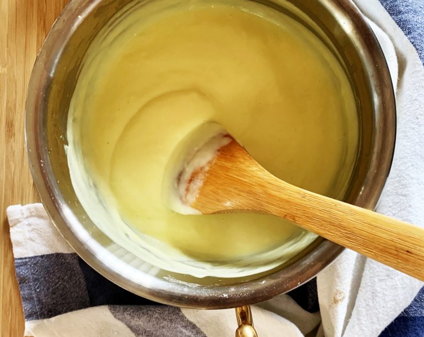 step 4 Bring mixture to a gentle boil over low heat, stirring constantly with a wooden spoon. You can use this cream with cakes or serve it as it is with a side of fresh fruit.