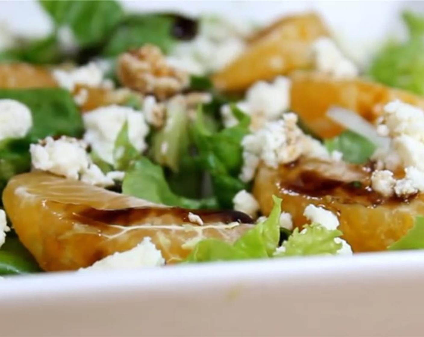 step 8 Crumble the Feta Cheese (1/2 cup) over the salad and drizzle the vinaigrette on top.