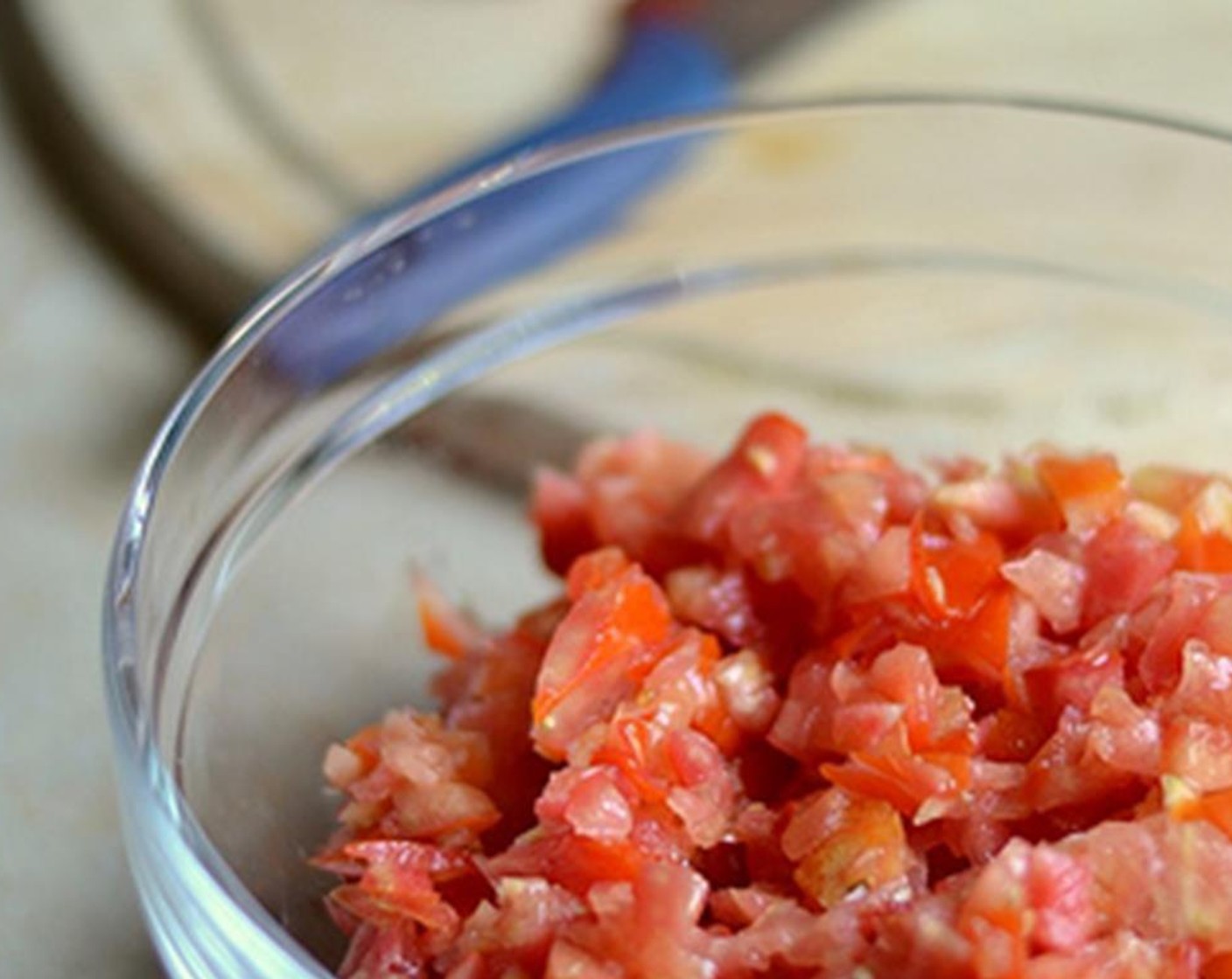 step 1 Chop Tomatoes (3) into small pieces and pulse in a food processor or just roughly chop them into small pieces.