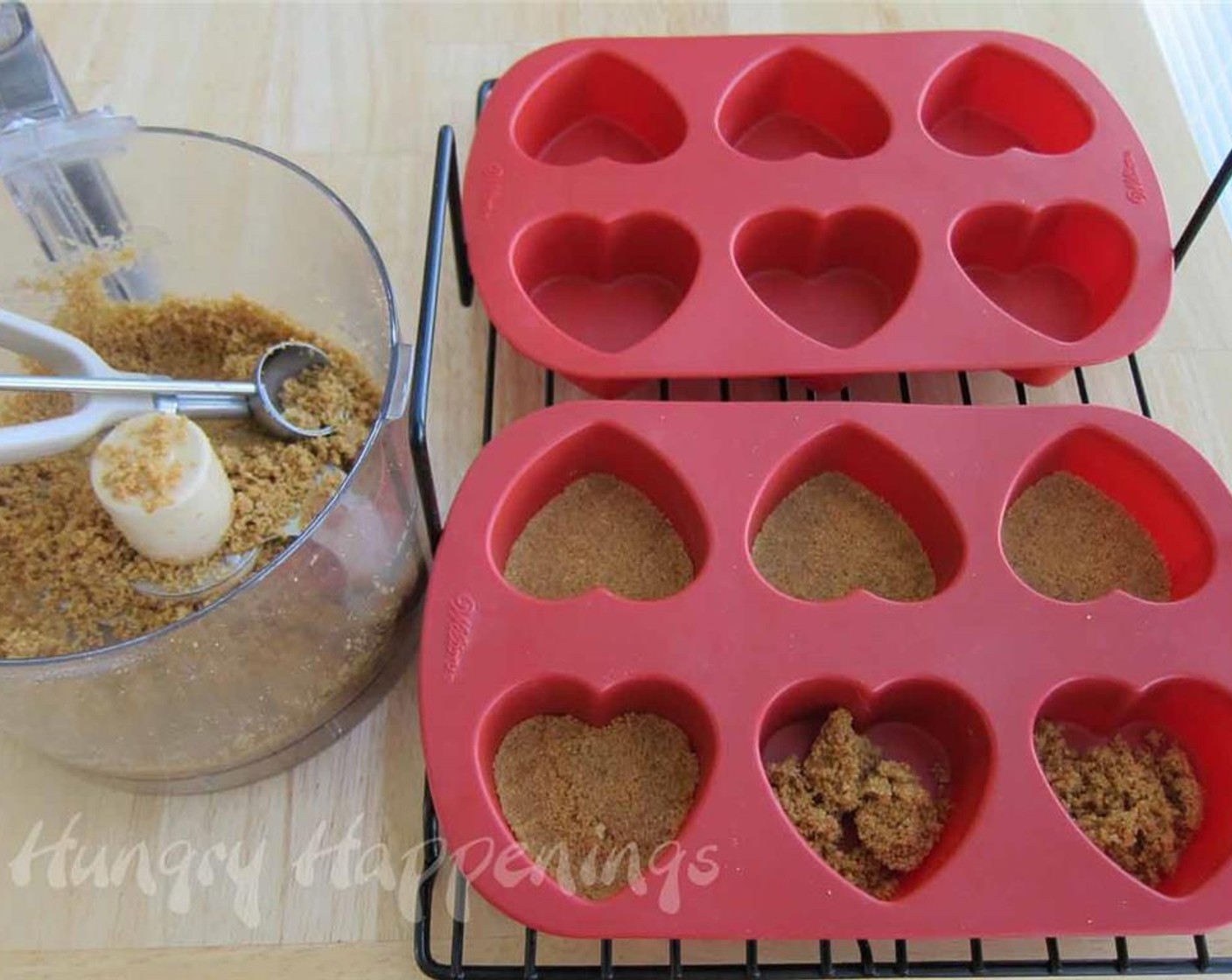 step 4 Put a tablespoon of crumb mixture into each heart. Press the crumbs down making an even crust. Refrigerate until ready to fill.