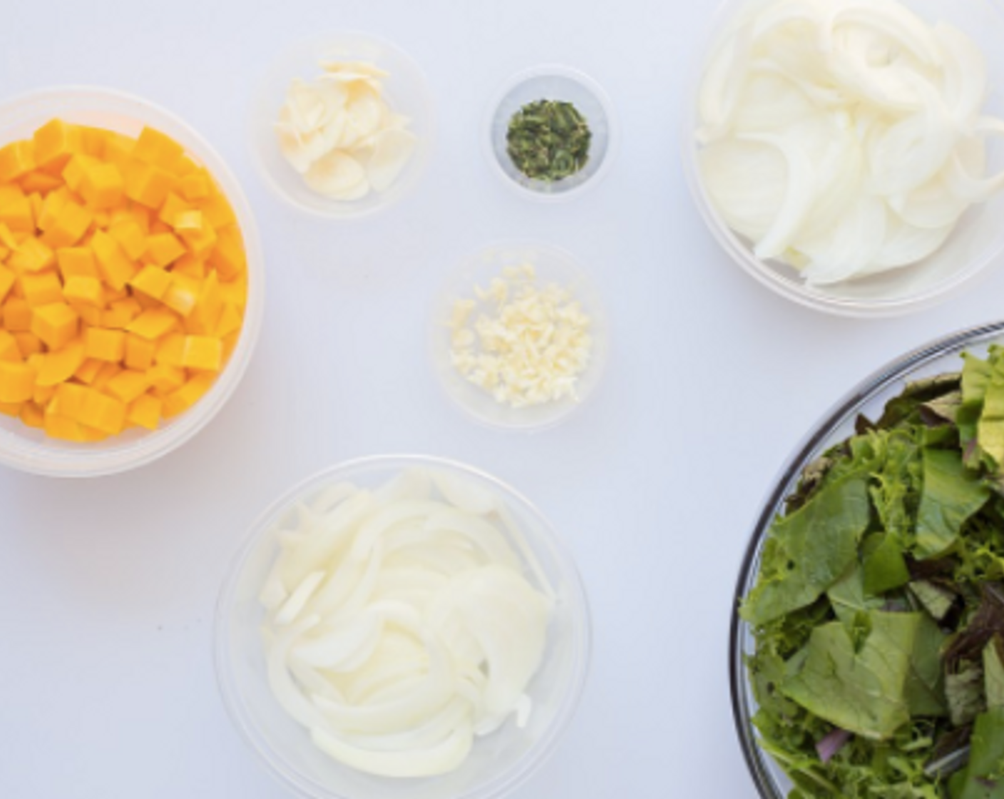 step 2 Measure out Vidalia Onion (1/2 cup) for greens and 1/2 cup for meatballs. Peel Garlic (2 cloves) ; slice one clove, and mince the other. Pick and chop thyme leaves. Cut or tear greens into bite-size pieces. Drain and rinse Canned White Beans (1 cup).