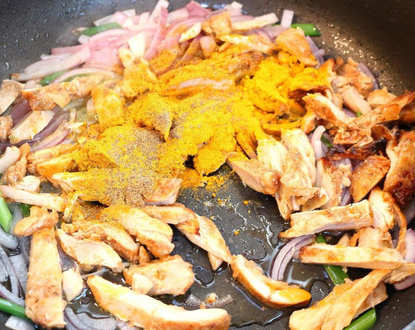 step 2 Add Curry Powder (3 Tbsp), Granulated Garlic (1 tsp), Ground Cumin (1 tsp), Fresh Ginger (1 pinch), Garam Masala (1 Tbsp), Kosher Salt (to taste), and Chicken (1). Saute until fragrant.